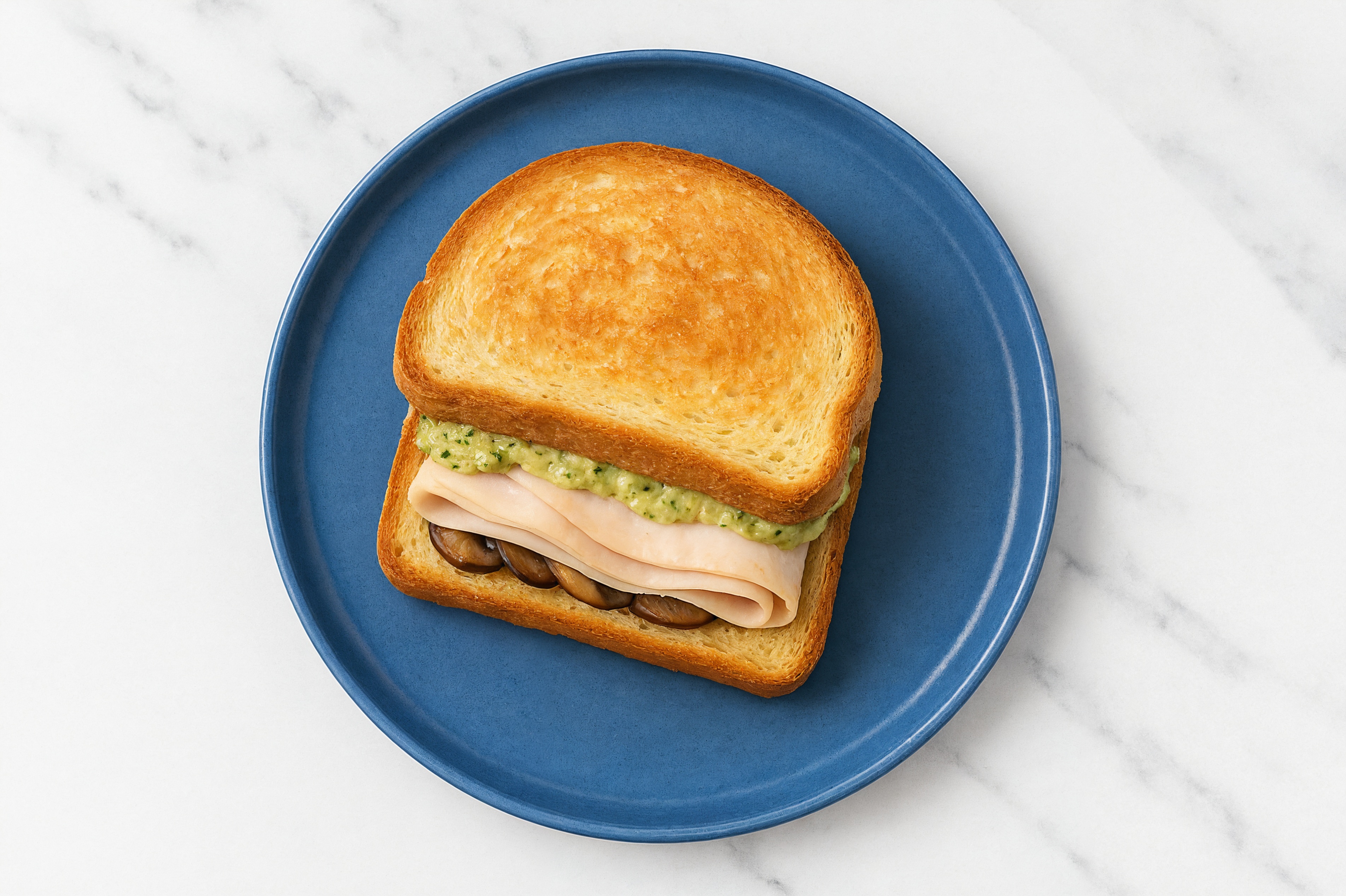 Creamy Artichoke Roasted Turkey Sandwich with Portabellas on Honey White Bread