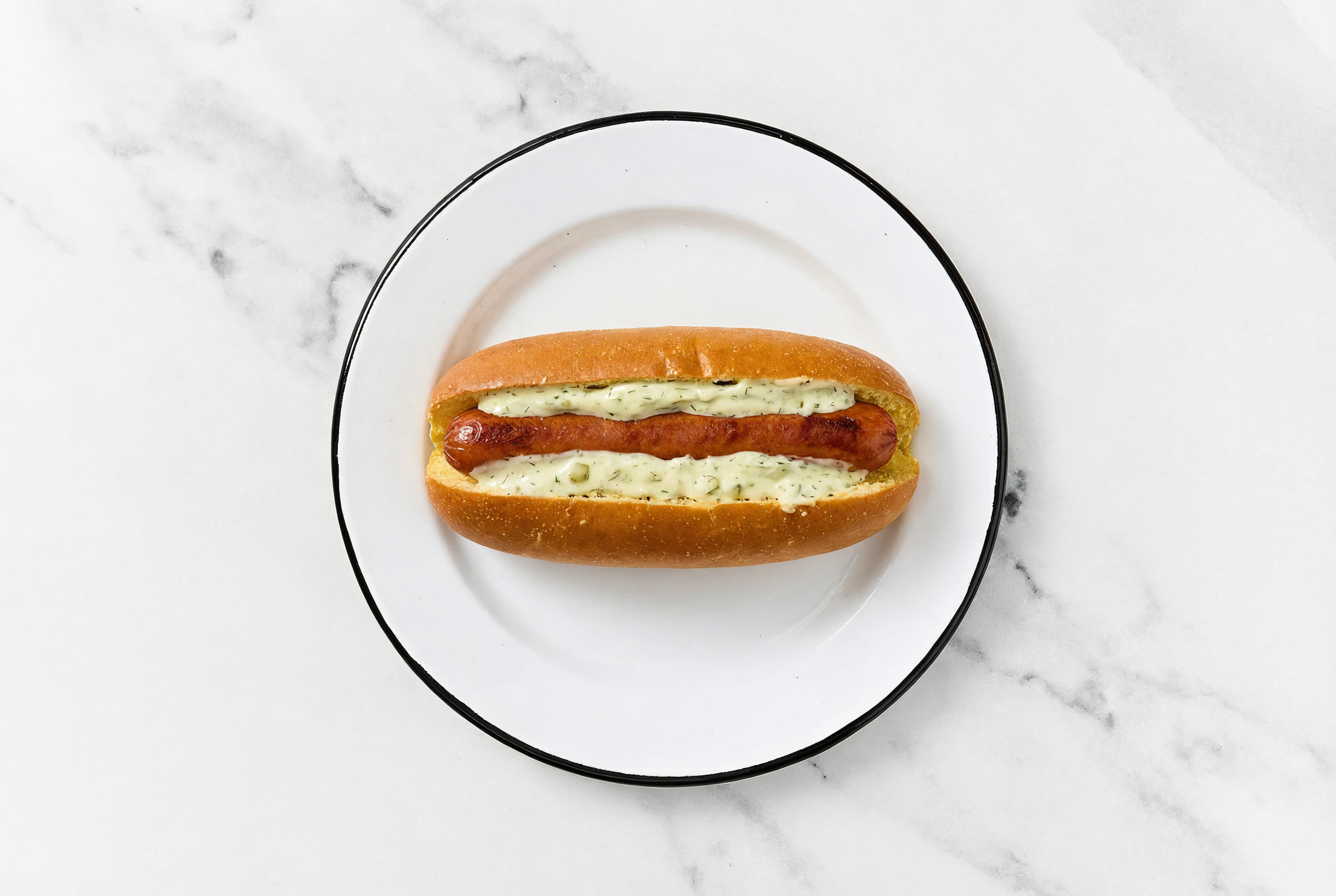 Beef Hot Dog with Garlic Sauce on Brioche