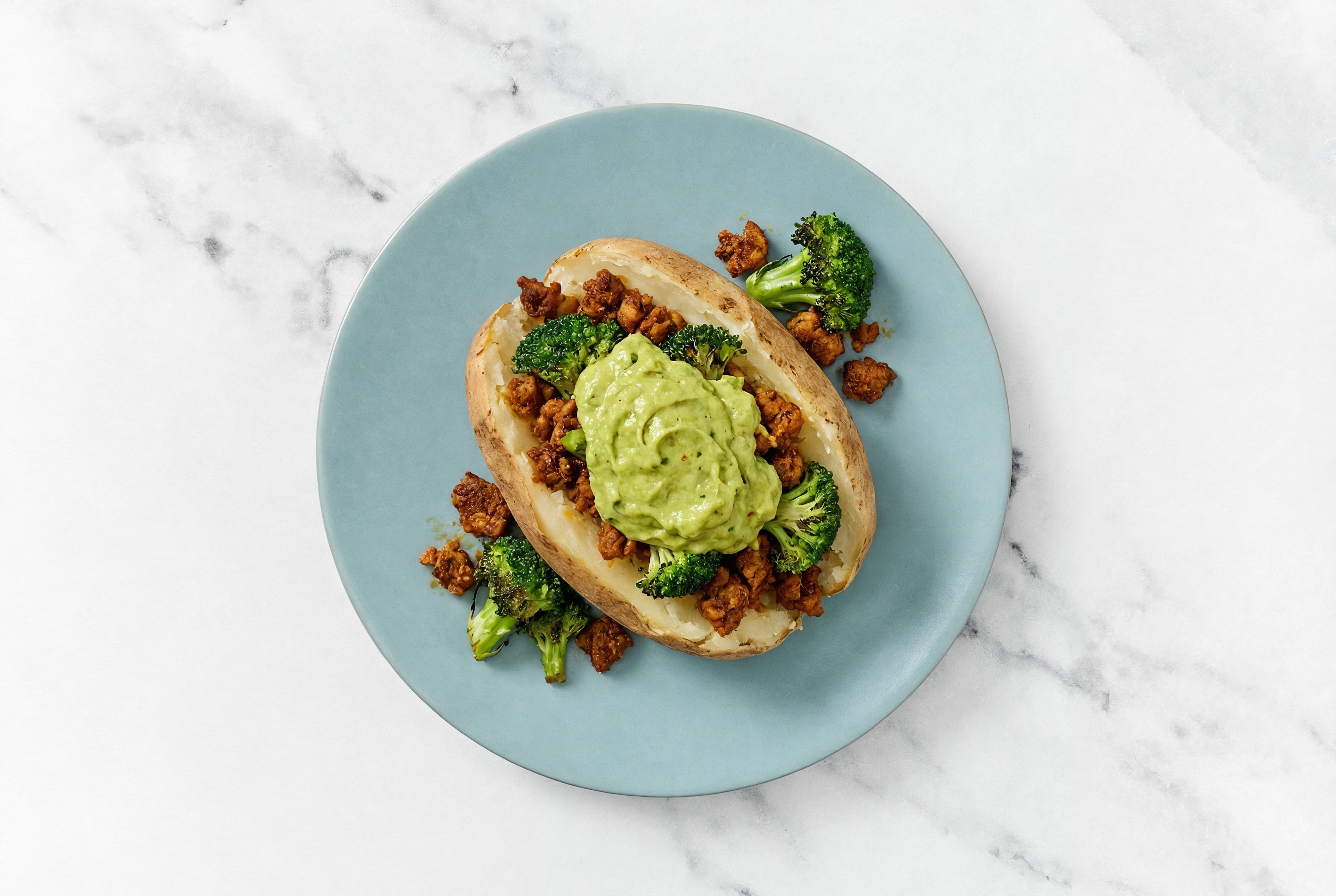 Plant-Based Chorizo + Guac Stuffed Potato with Broccoli Florets