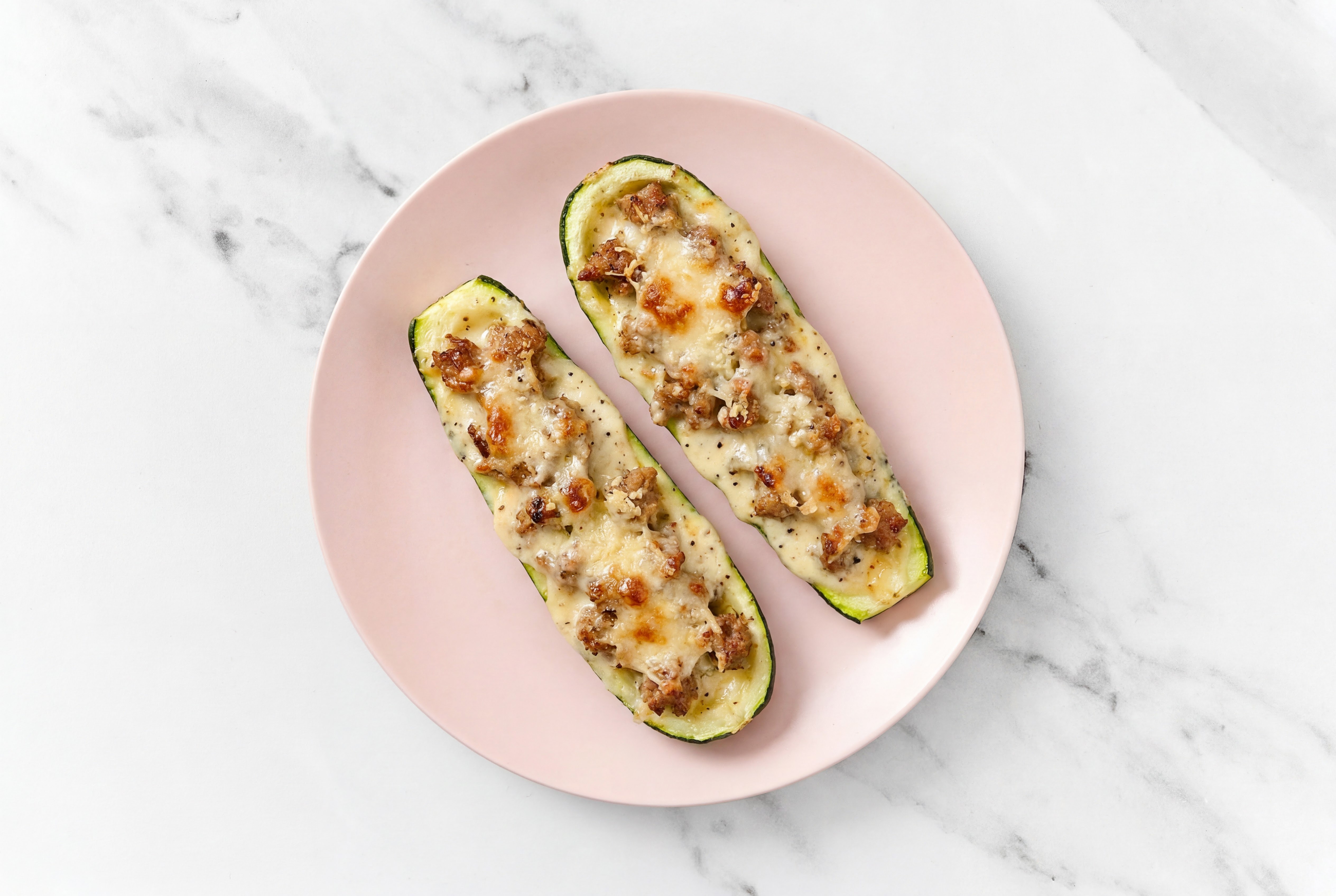 Cheesy Sweet Italian Pork Sausage Zucchini Boats