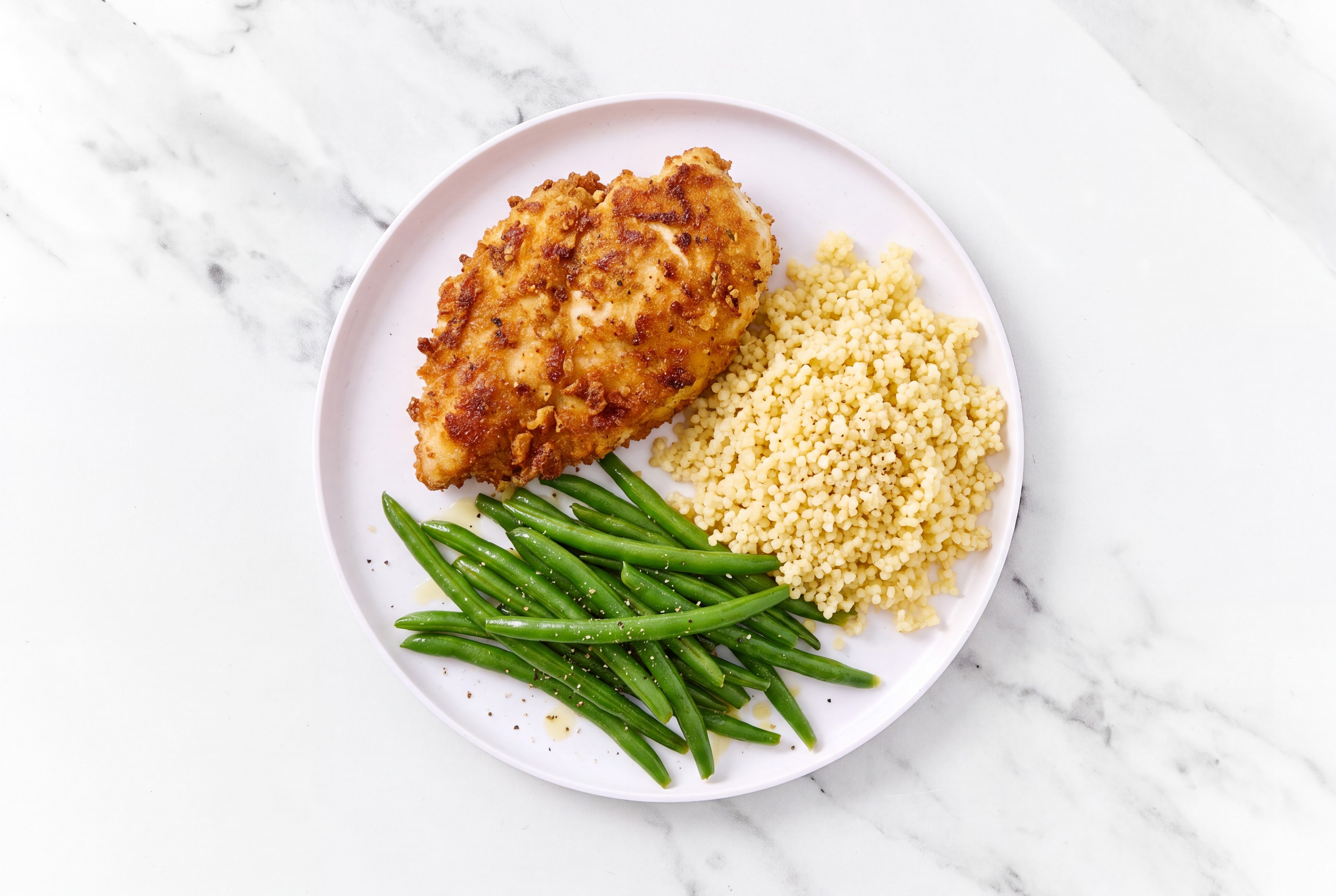 Parmesan Breaded Chicken Cutlet with Green Beans & Couscous