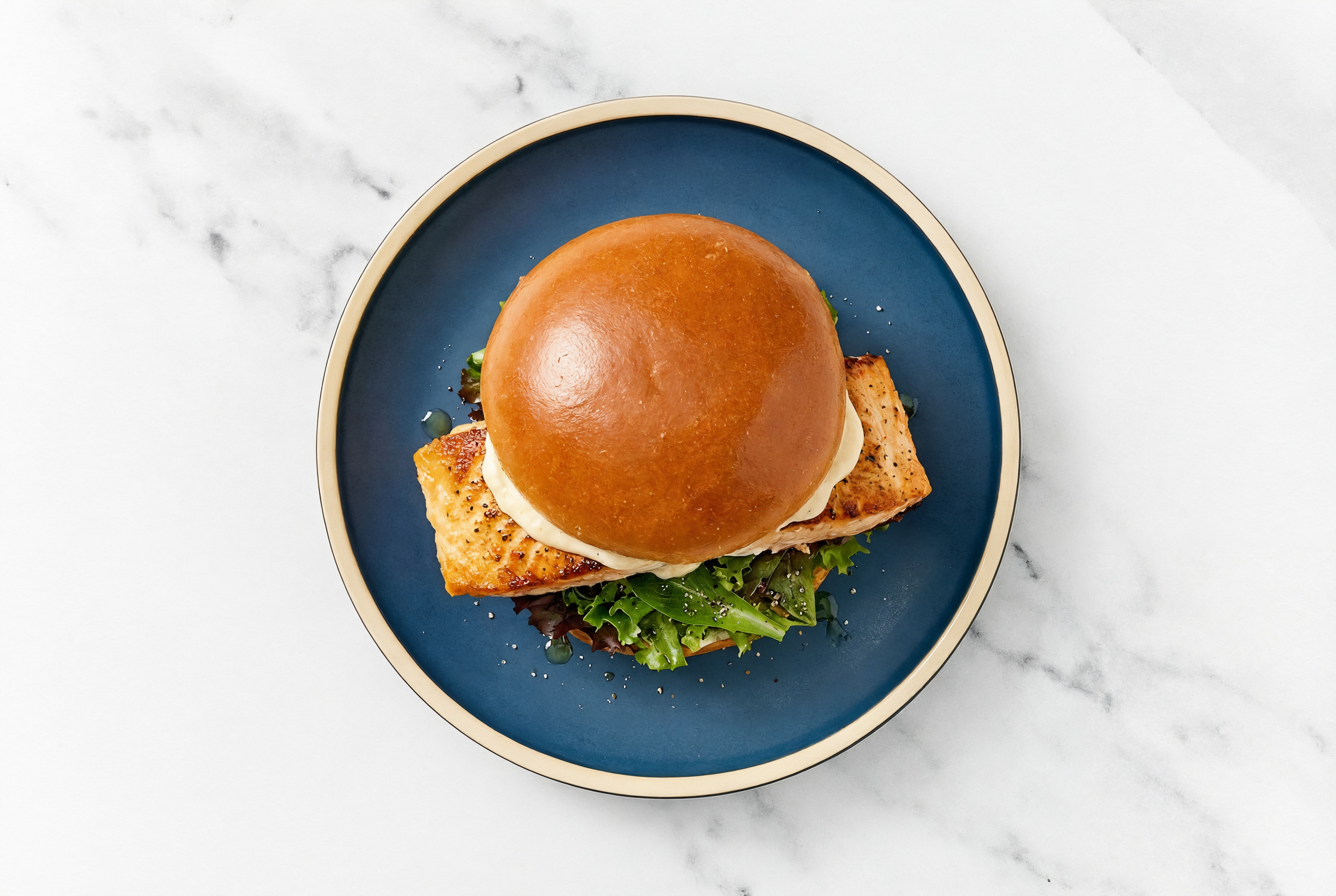 Horseradish Salmon Sandwich on Brioche with Spring Mix