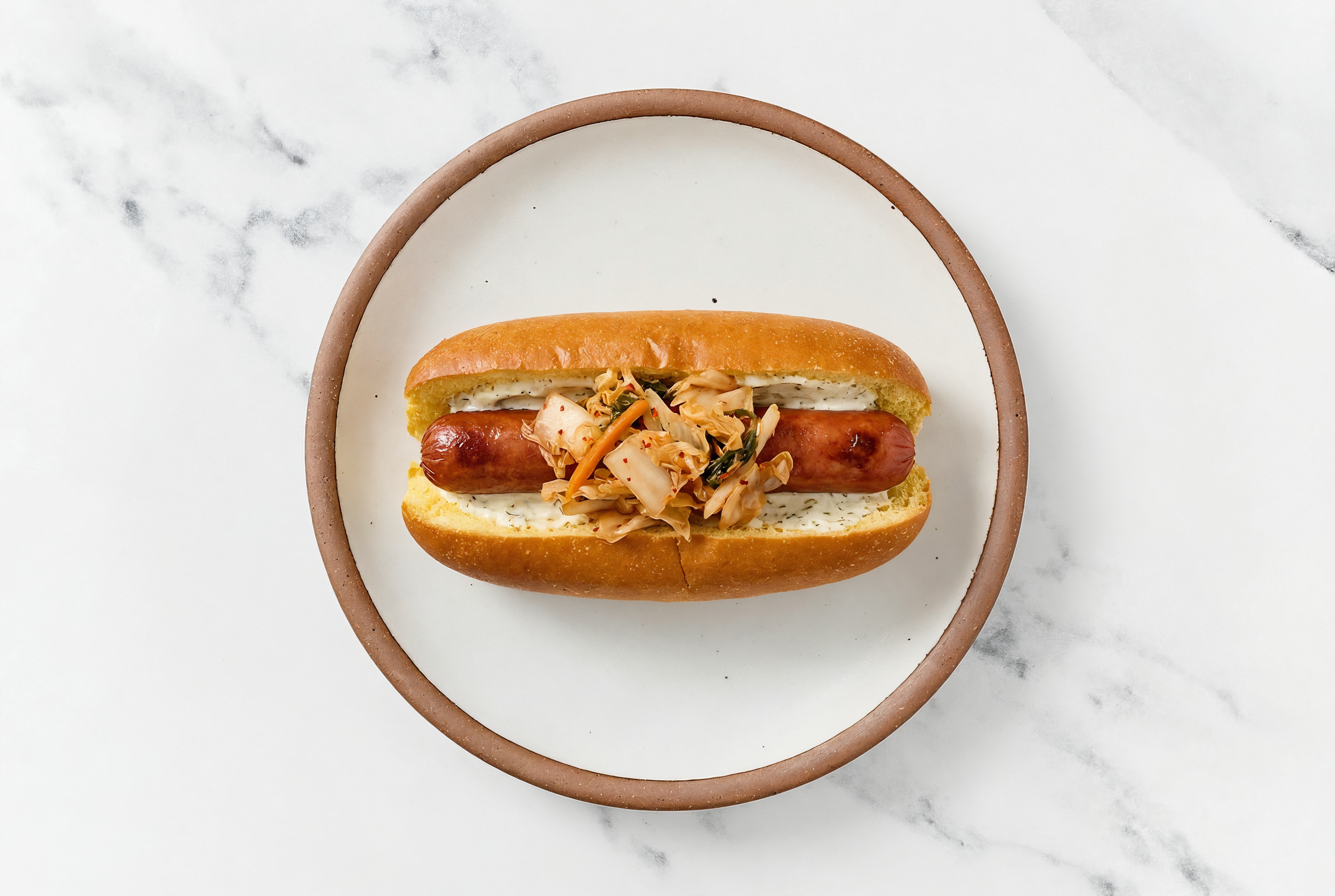 Kimchi Beef Hot Dog with Garlic Sauce on Brioche