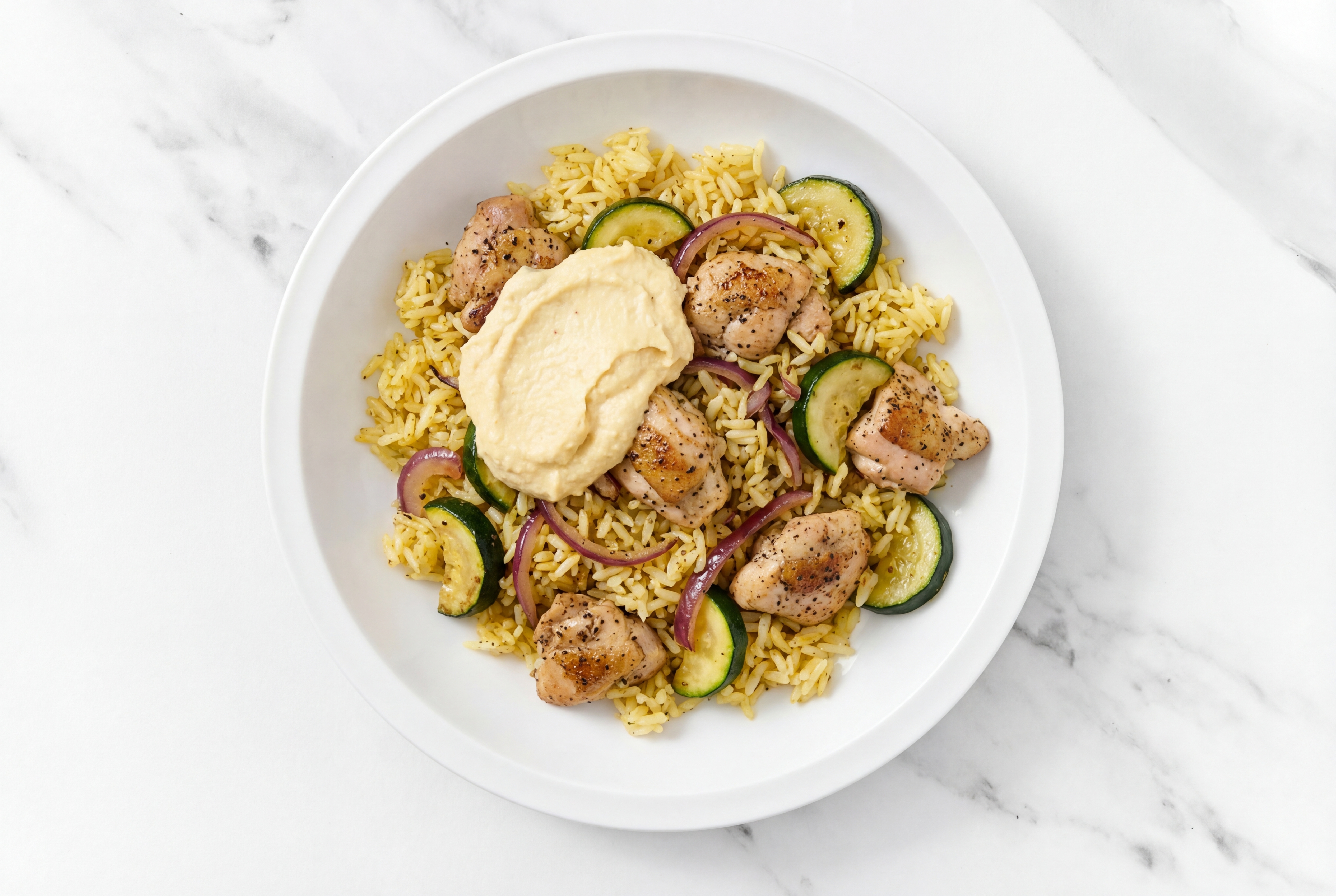 Hearty Mediterranean Chicken Thighs + Sautéed Veggies with Lemon Garlic Hummus