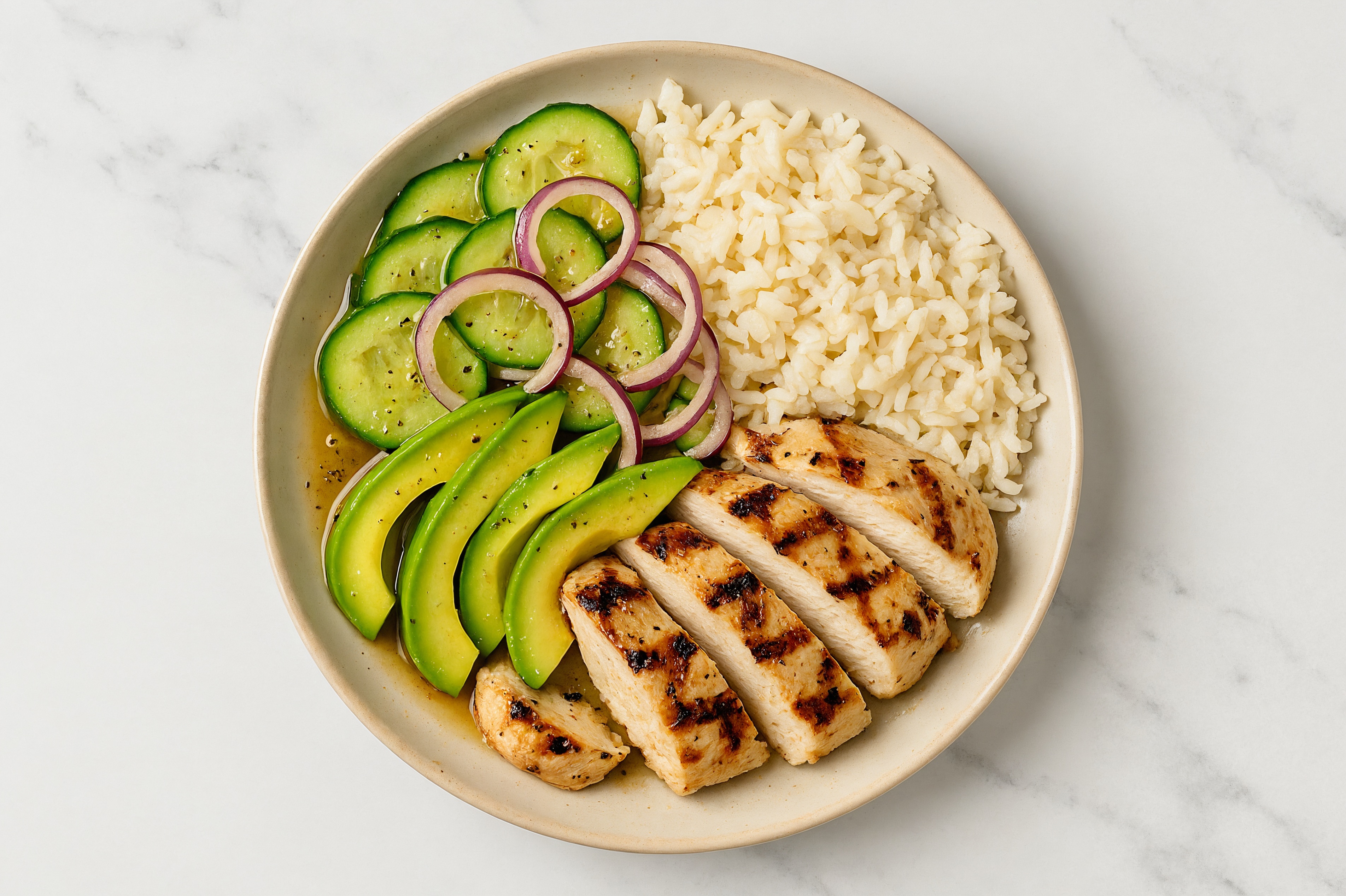 Grilled Chicken + Avocado Rice Bowl with Cucumbers + Red Onion