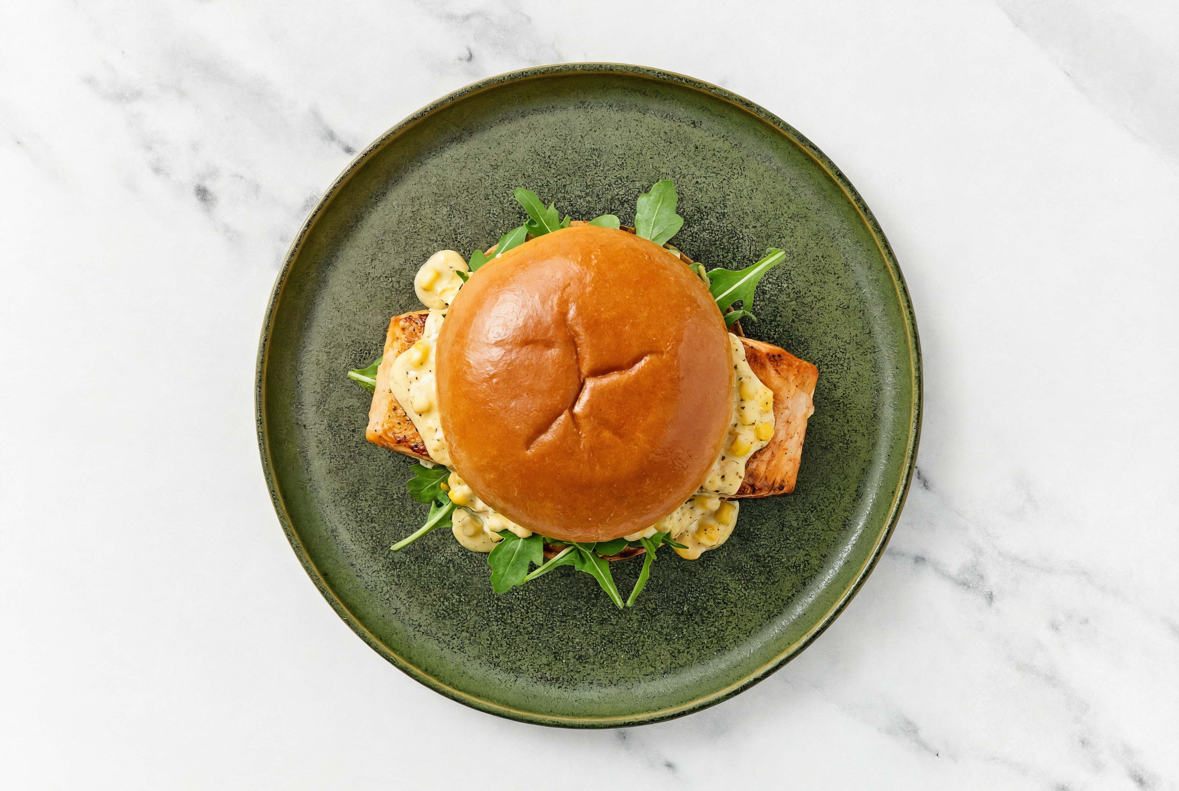 Street Corn Salmon Sandwich on Brioche with Arugula