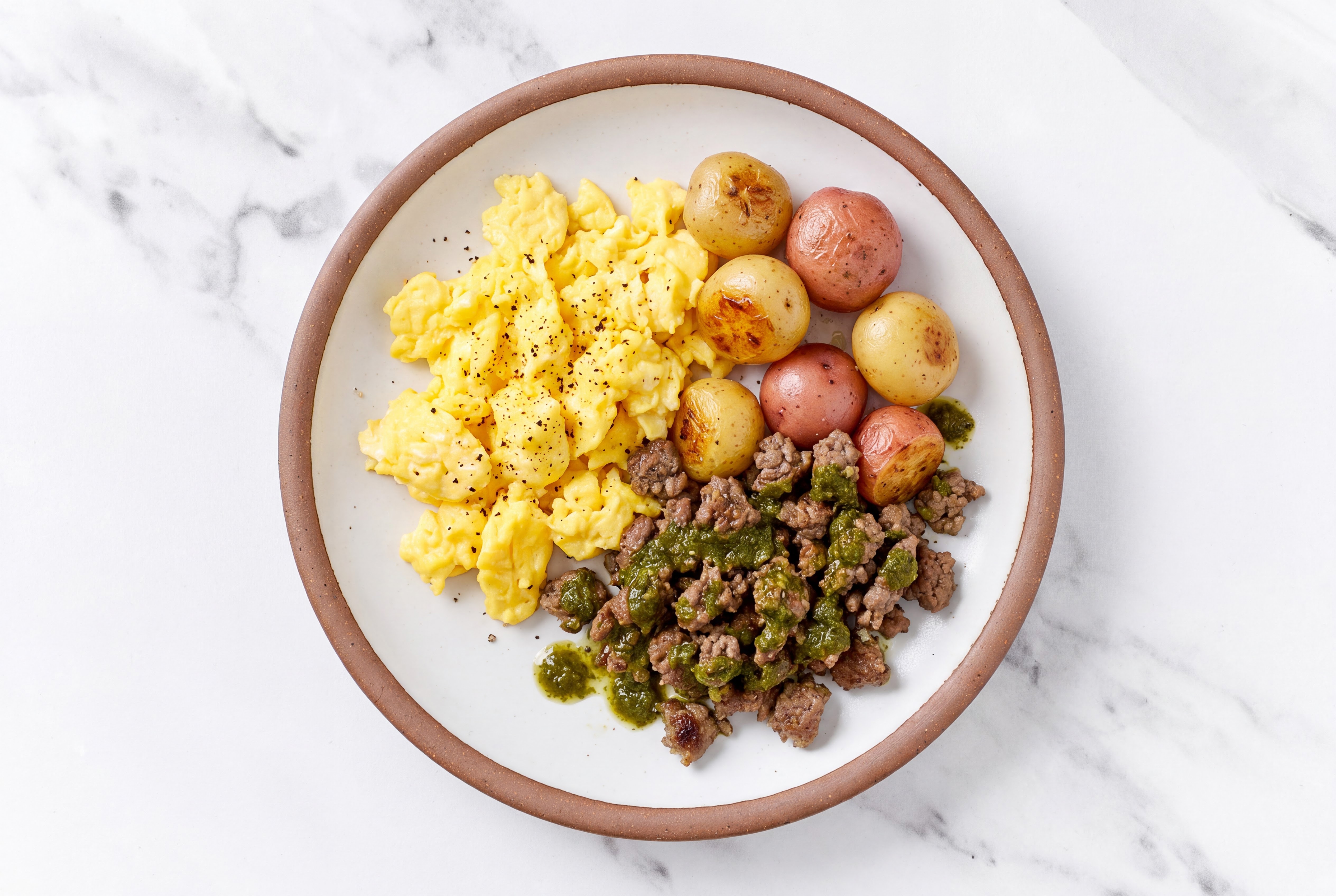 Eggs + Zhoug Beef Plate with Multicolor Potatoes