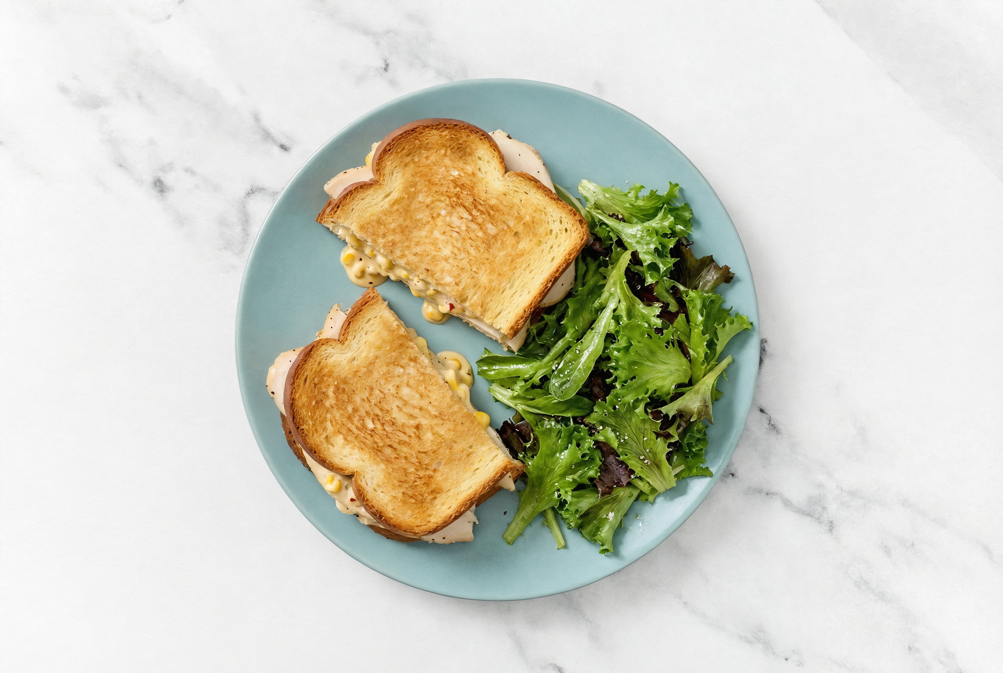 Street Corn Roasted Chicken Sandwich with Spring Mix on Honey White Bread