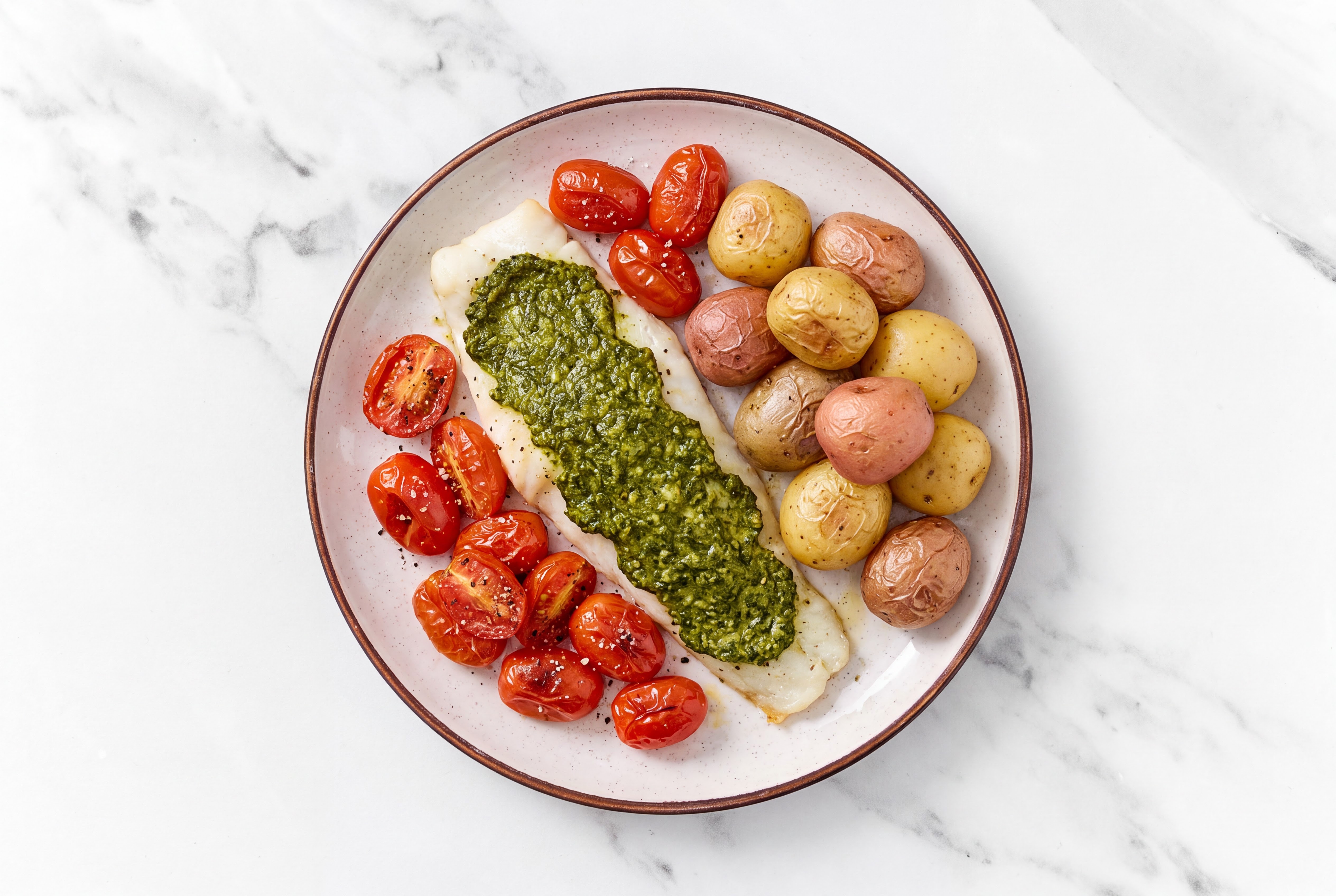 Wild Caught Cod with Roasted Tomatoes + Pesto