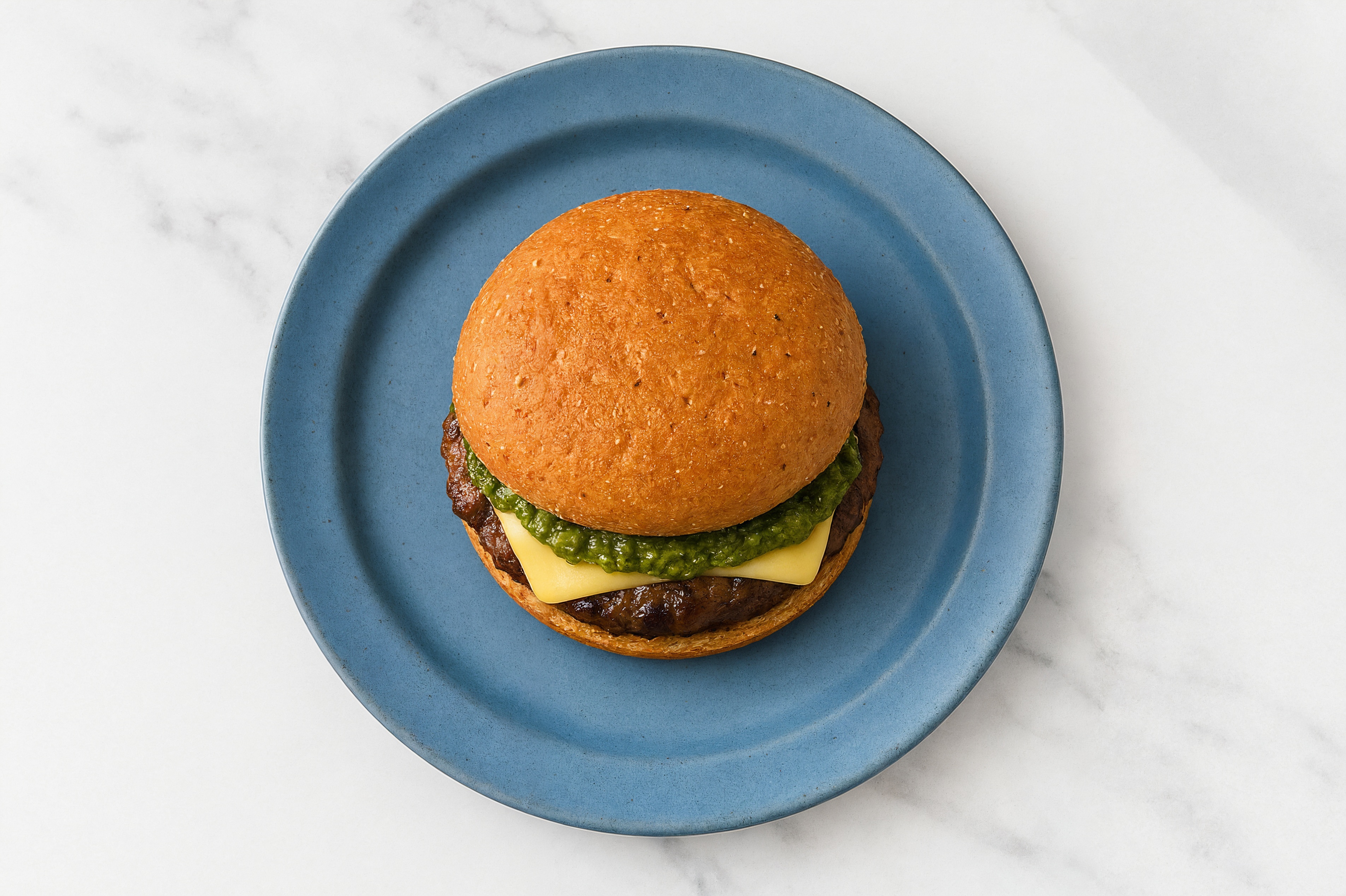 Lamb Burger on Sprouted Grain with Spinach Pesto & Gouda