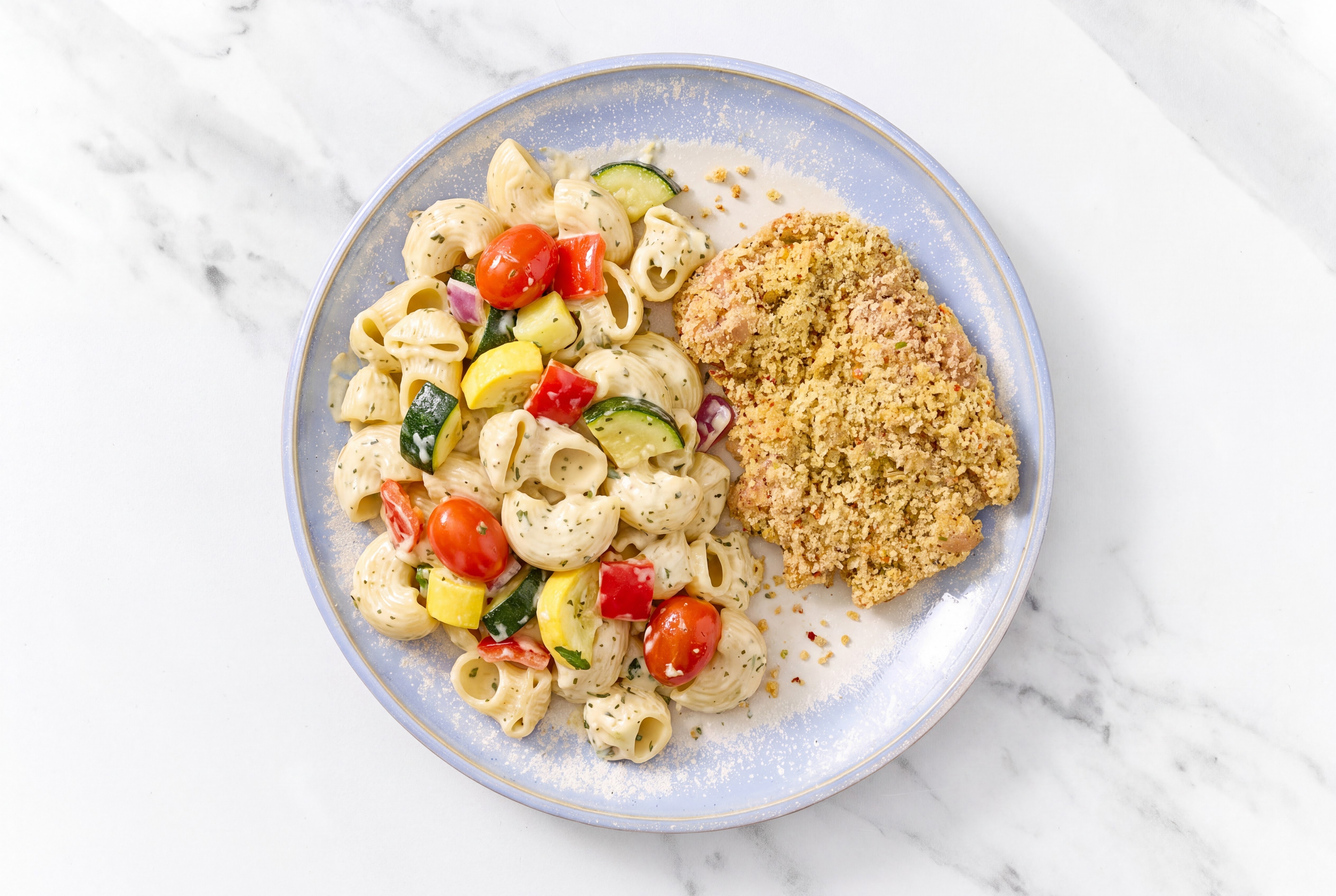 Crispy Garlic Chicken over Creamy Chiocciole Pasta with Mixed Veggies
