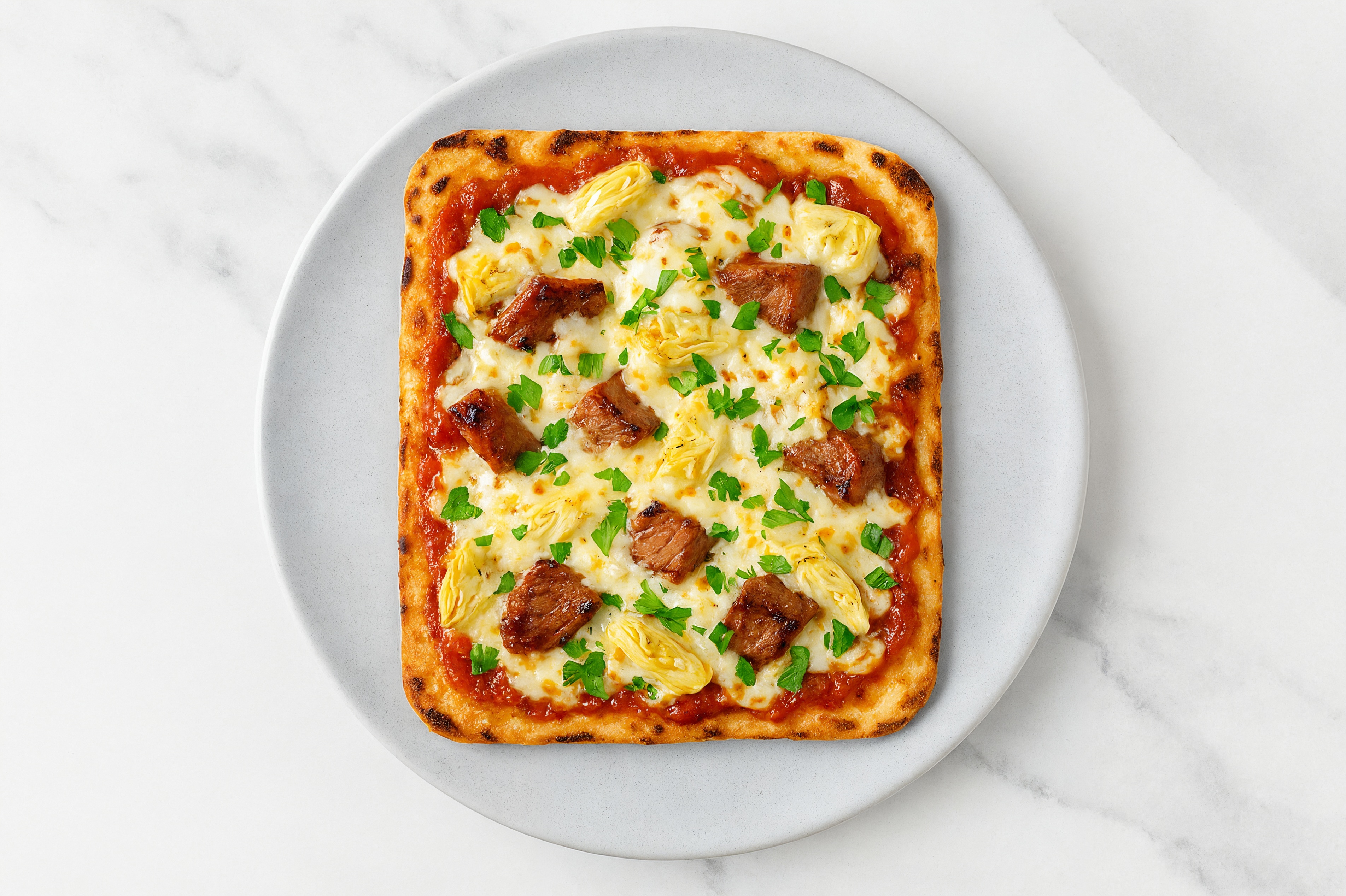 Classic Sirloin + Artichoke Pizza with Parsley