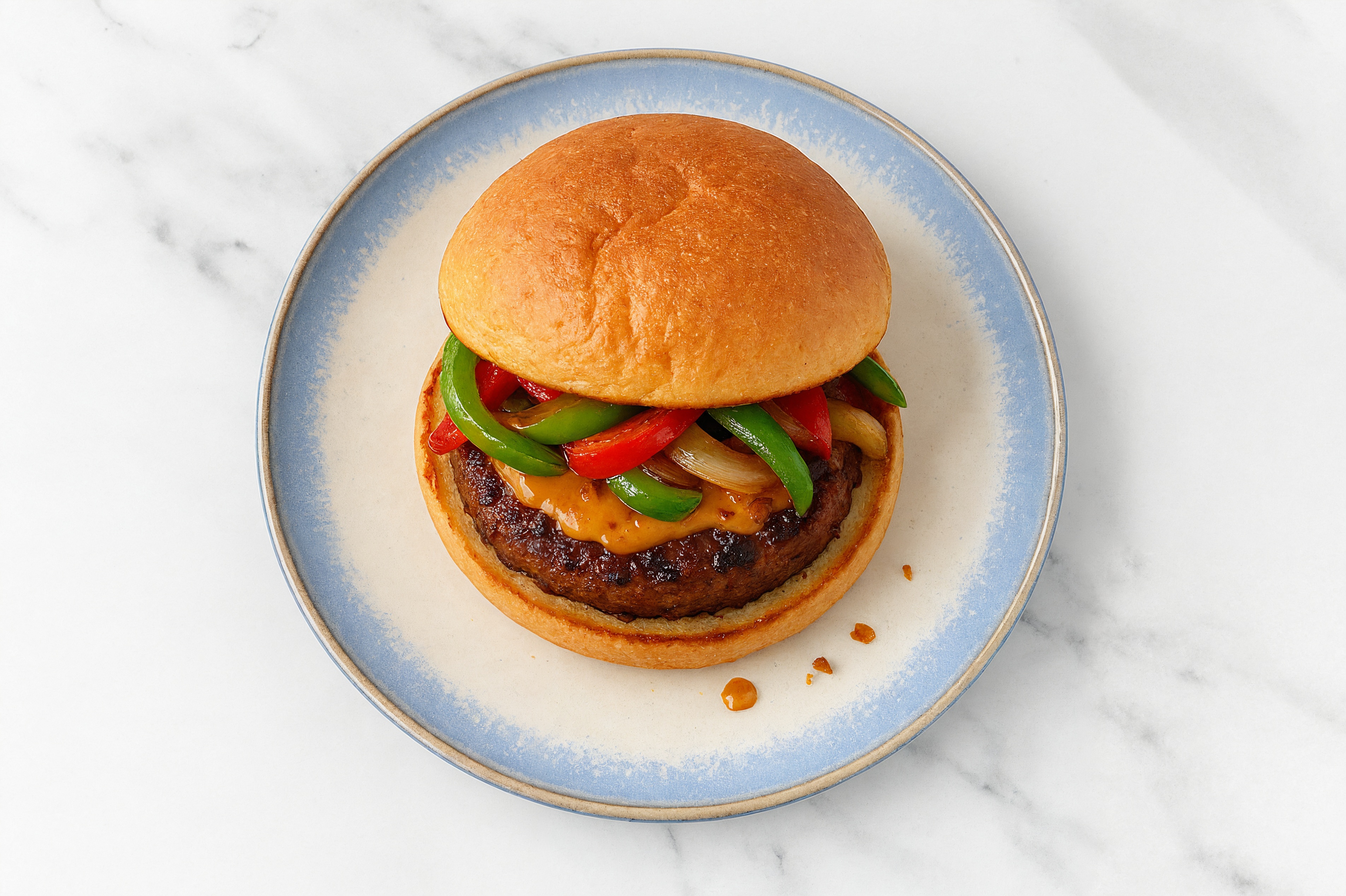 Onion + Pepper Beyond Burger on GF Bun with Smoky BBQ Sauce