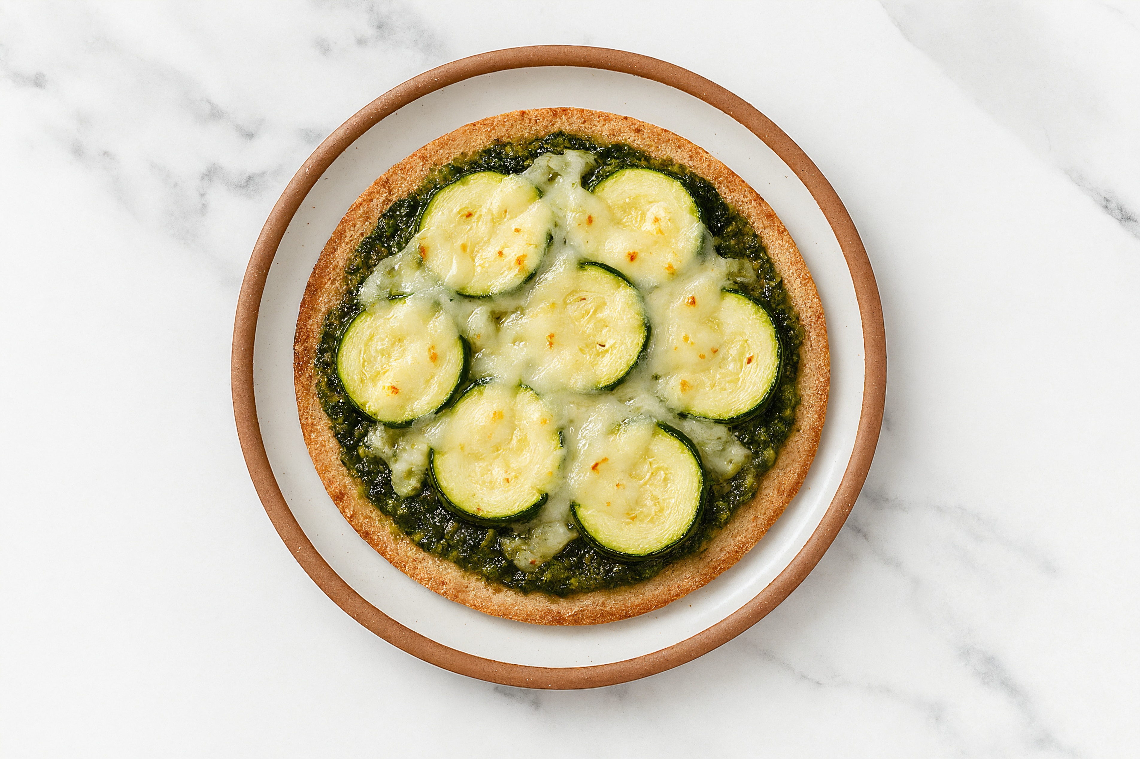 Cheezy Zucchini Pesto Flatbread with Whole Grain Pita Pockets