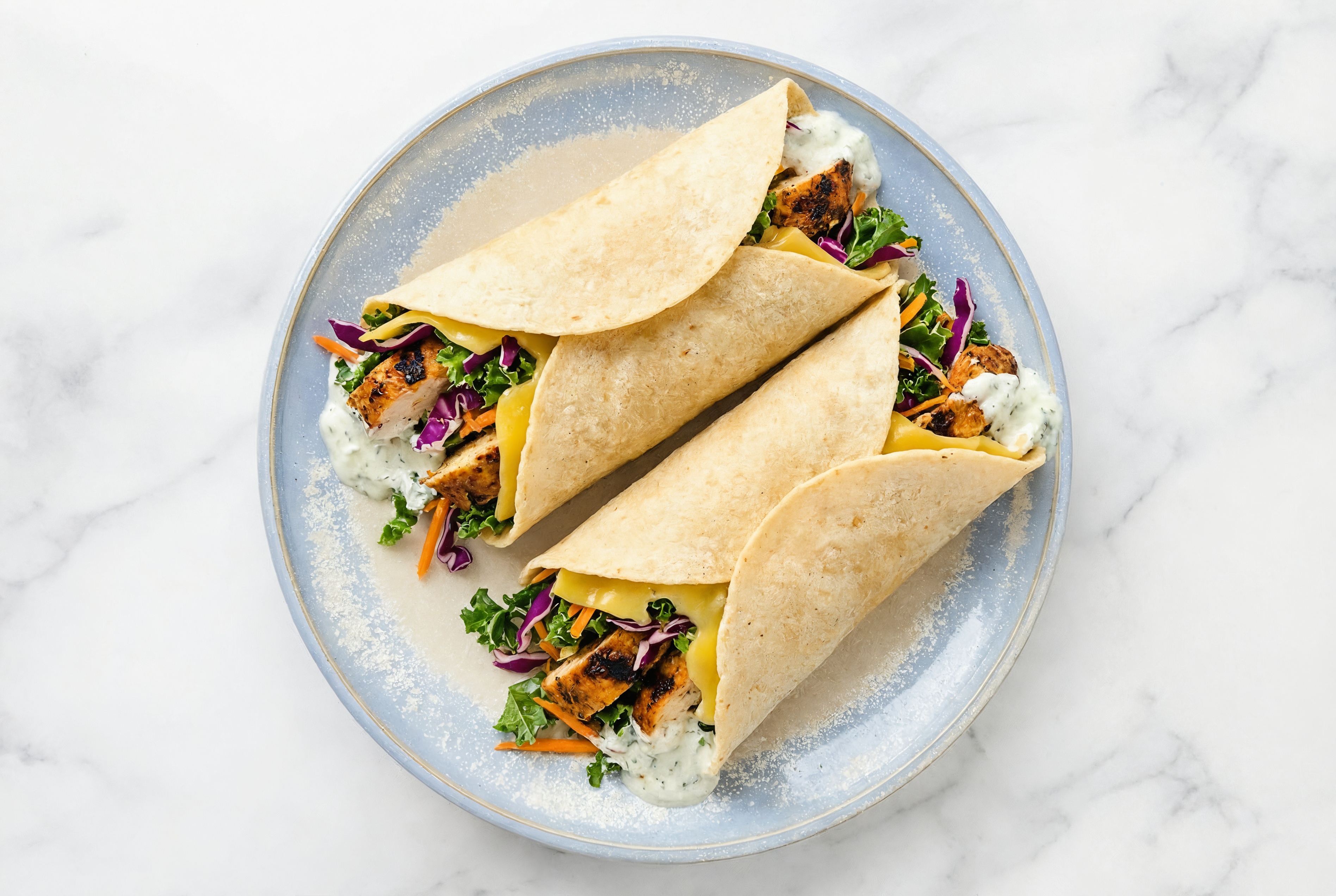 Creamy Blackened Chicken + Vegan Cheddar Tortilla Wraps with Rainbow Veggies