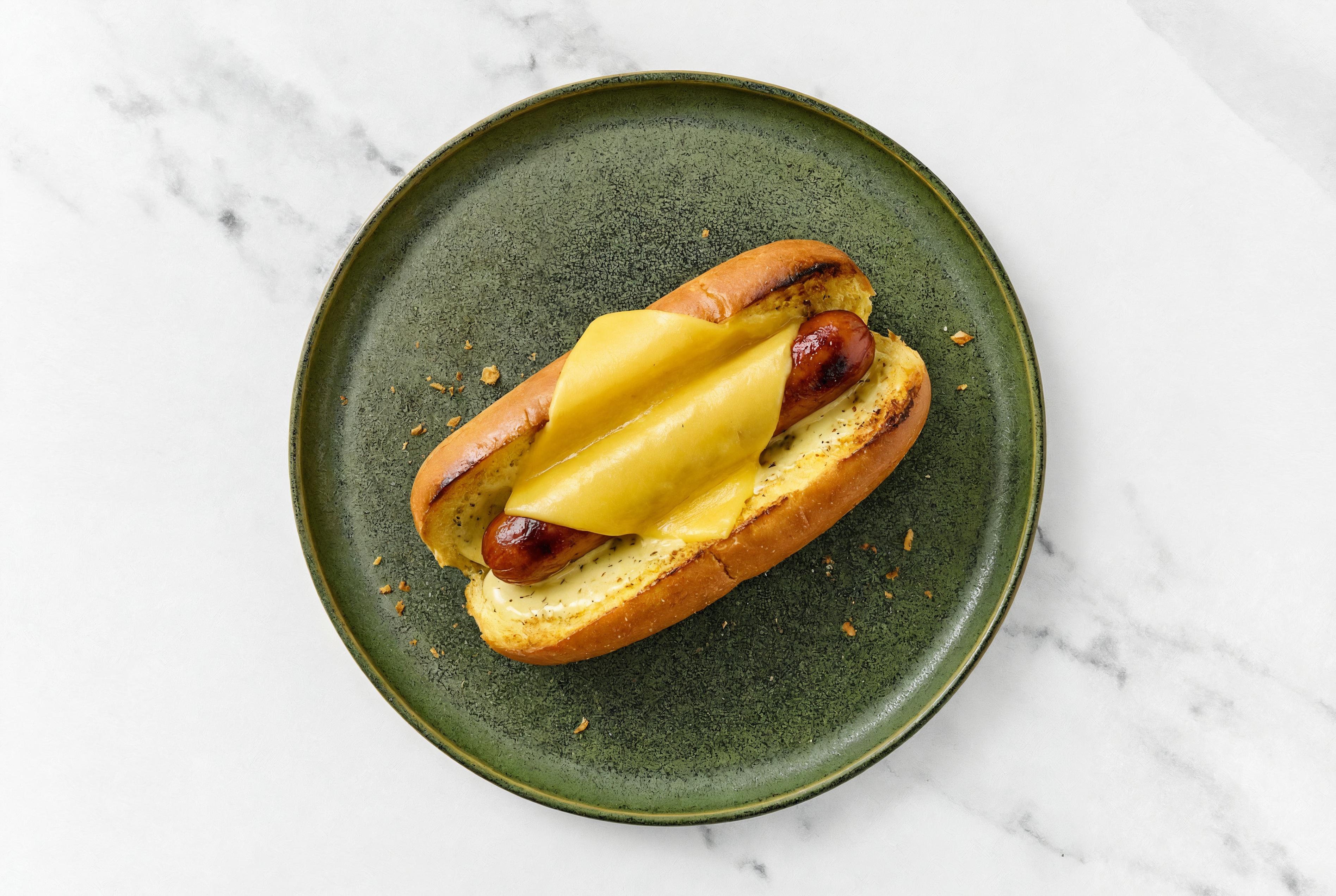 Vegan Cheddar Beef Hot Dog with Honey Musard Garlic Sauce on Brioche