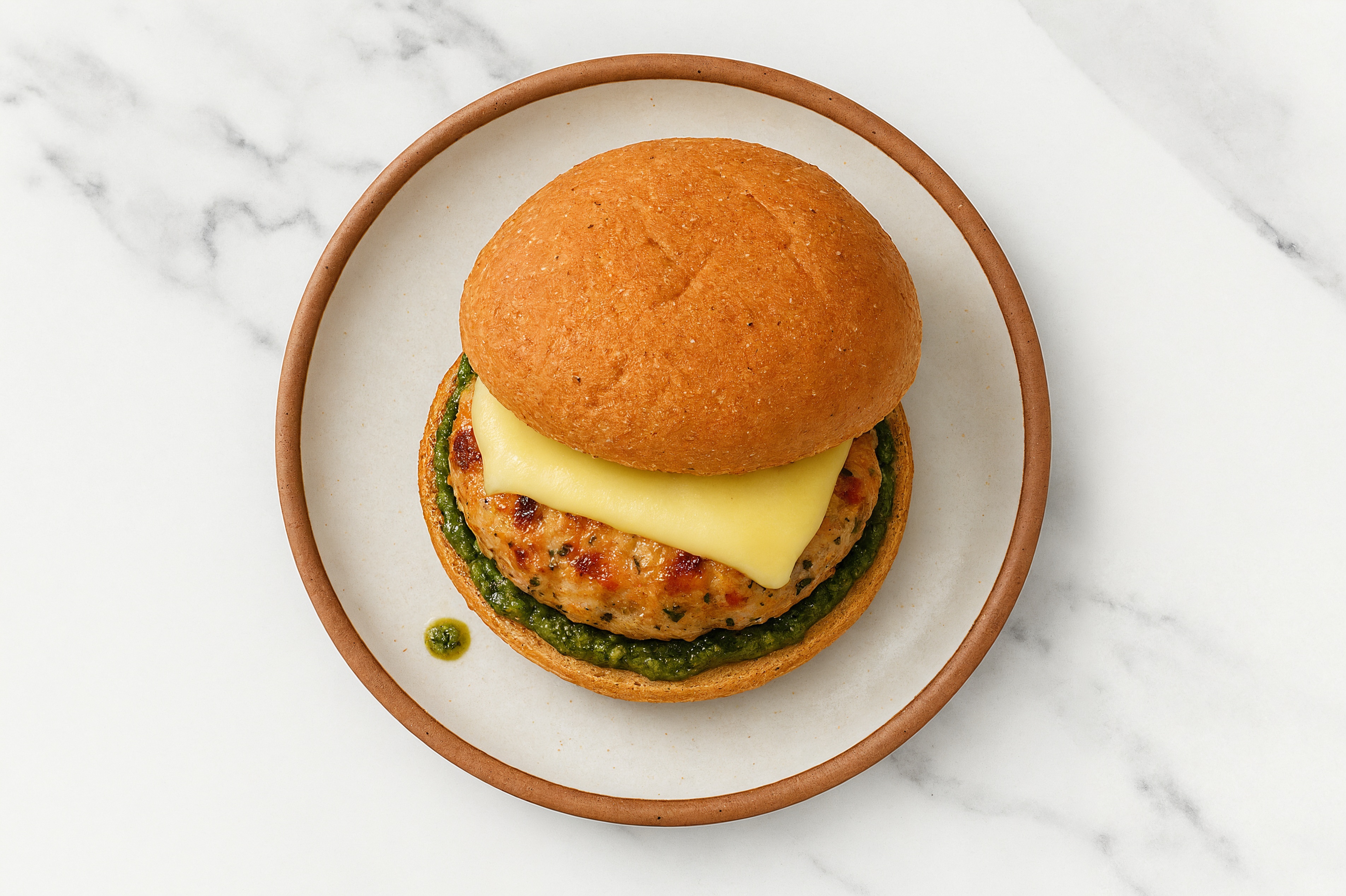 Garlic Chicken Burger on Sprouted Grain with Spinach Pesto & Havarti