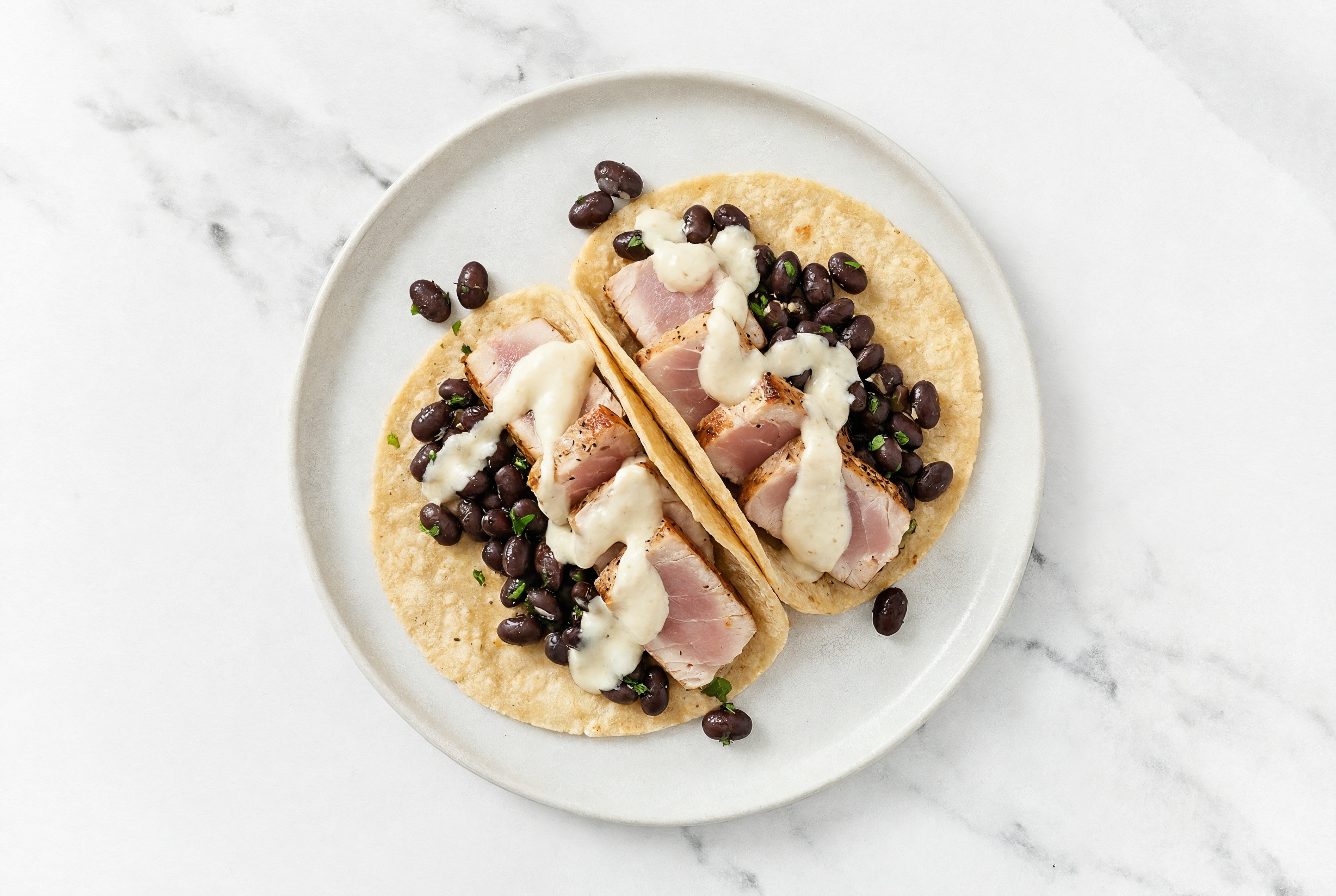 Cuban Spiced Black Beans Bean Tacos with Seared Tuna & Garlic Sauce