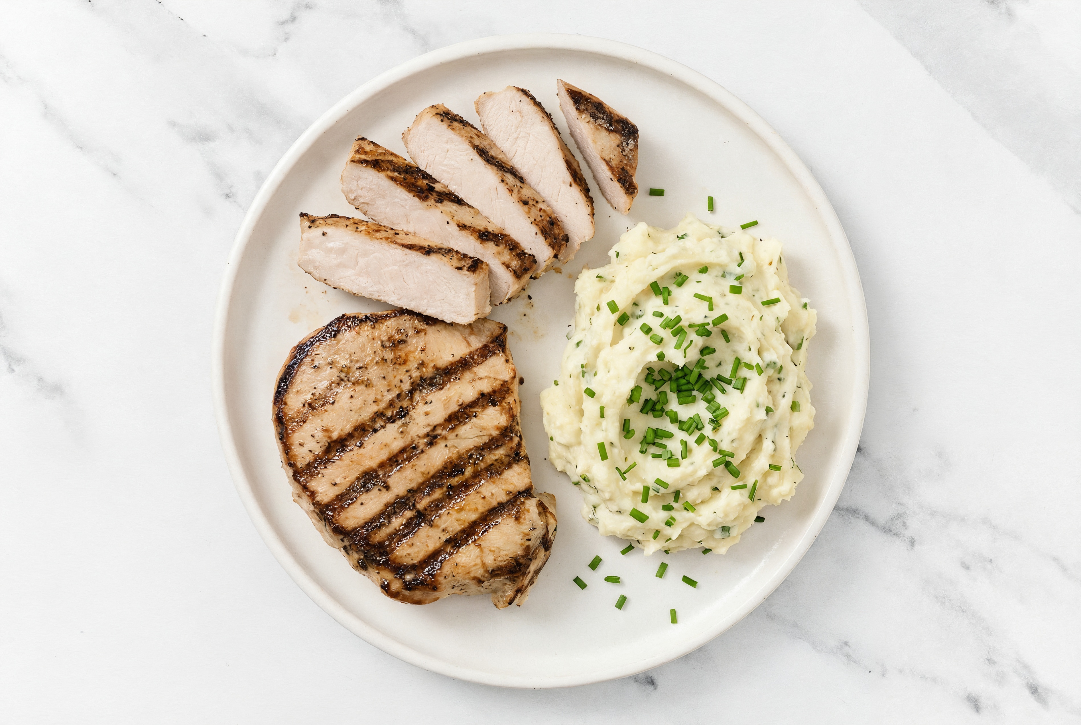 Pork Chop + Creamy Herb Mashed Russet Potatoes
