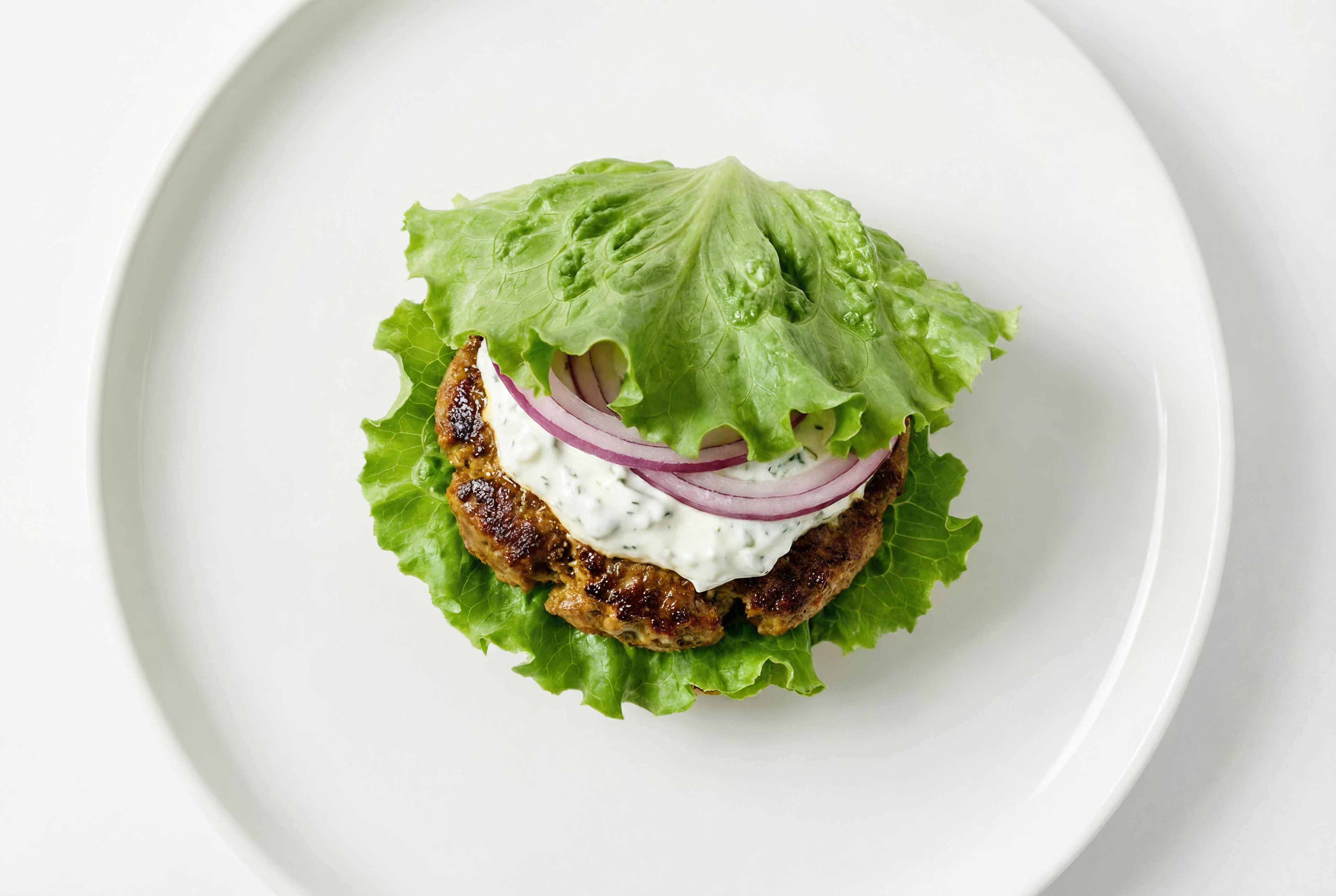 Mediterranean Lamb Burger on Lettuce Buns with Madras Curry Powder