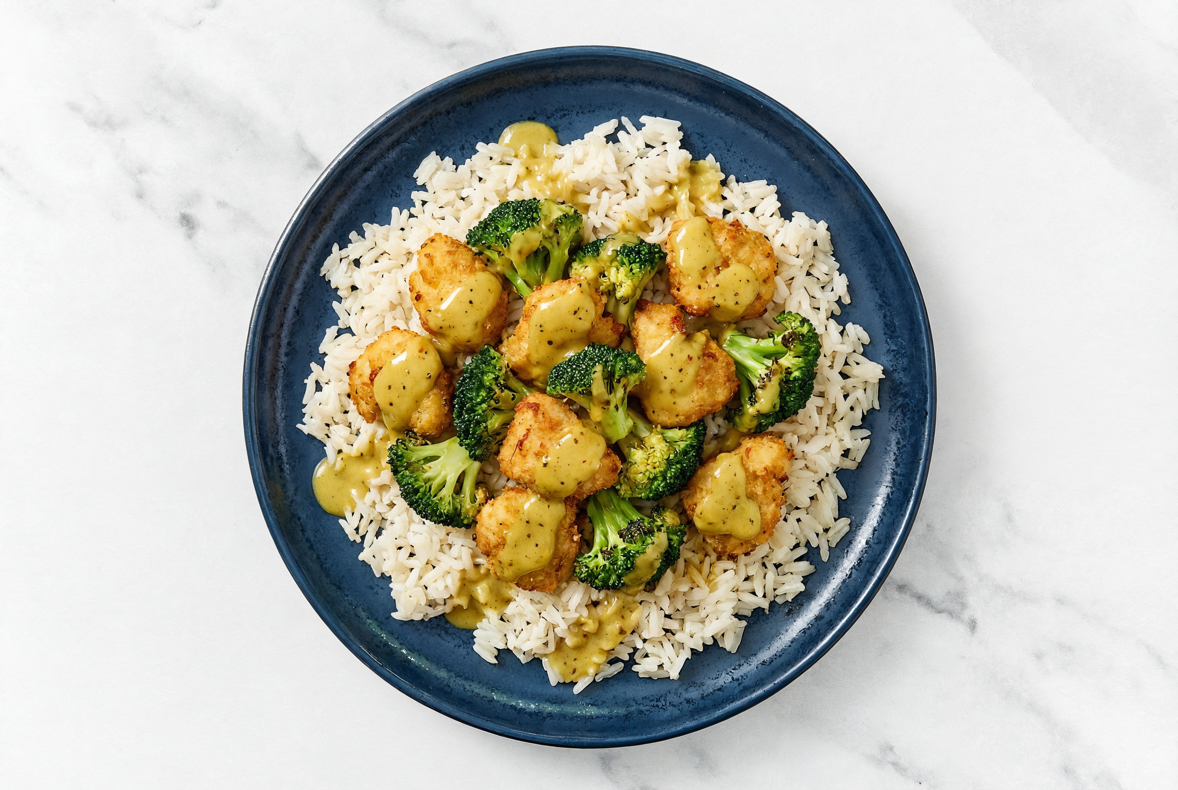 Rice Bowl with Chicken Nuggets + Organic Broccoli Florets