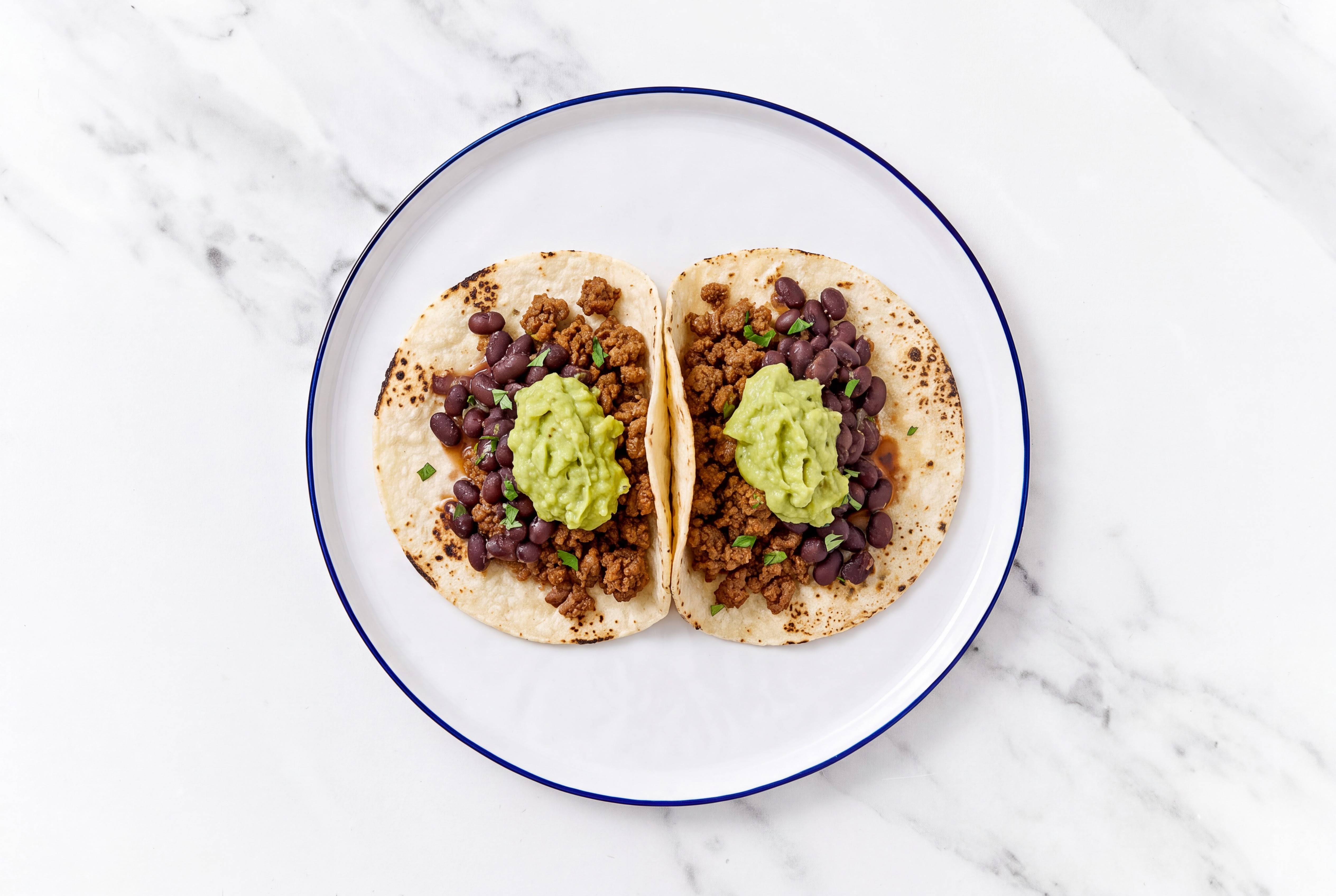 Hearty Ground 93/7 Lean Beef Tacos with Guacamole & Spiced Beans