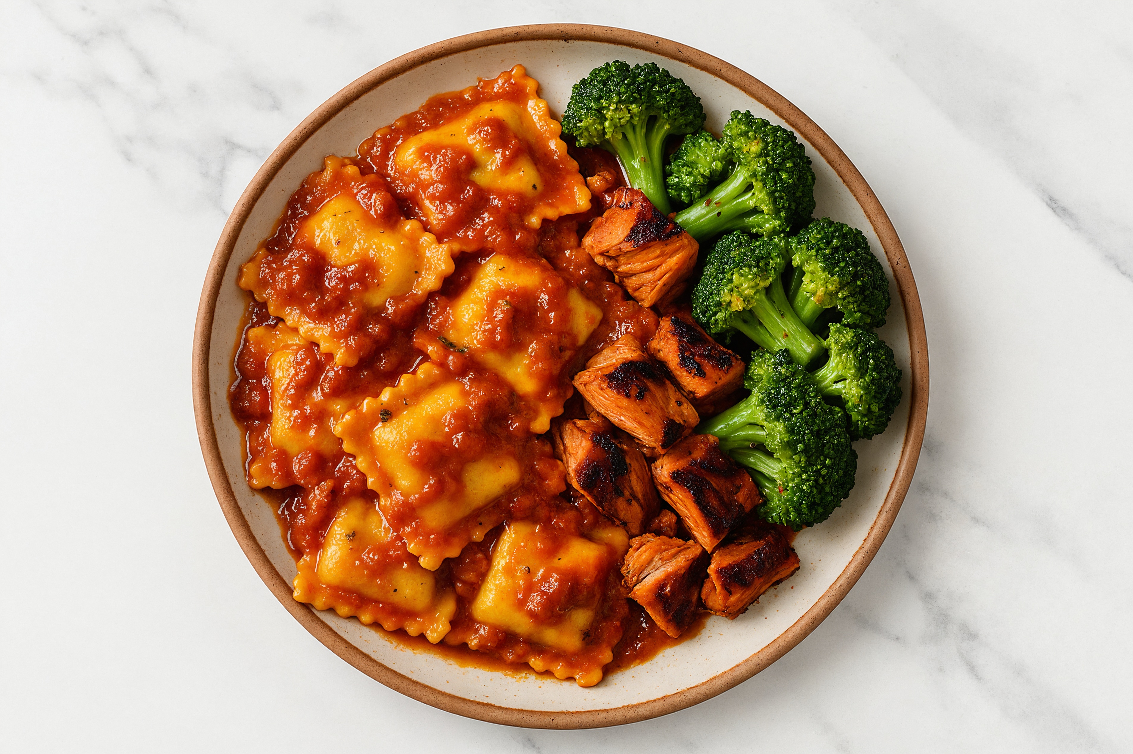 Ravioli Marinara with Blackened Salmon & Broccoli