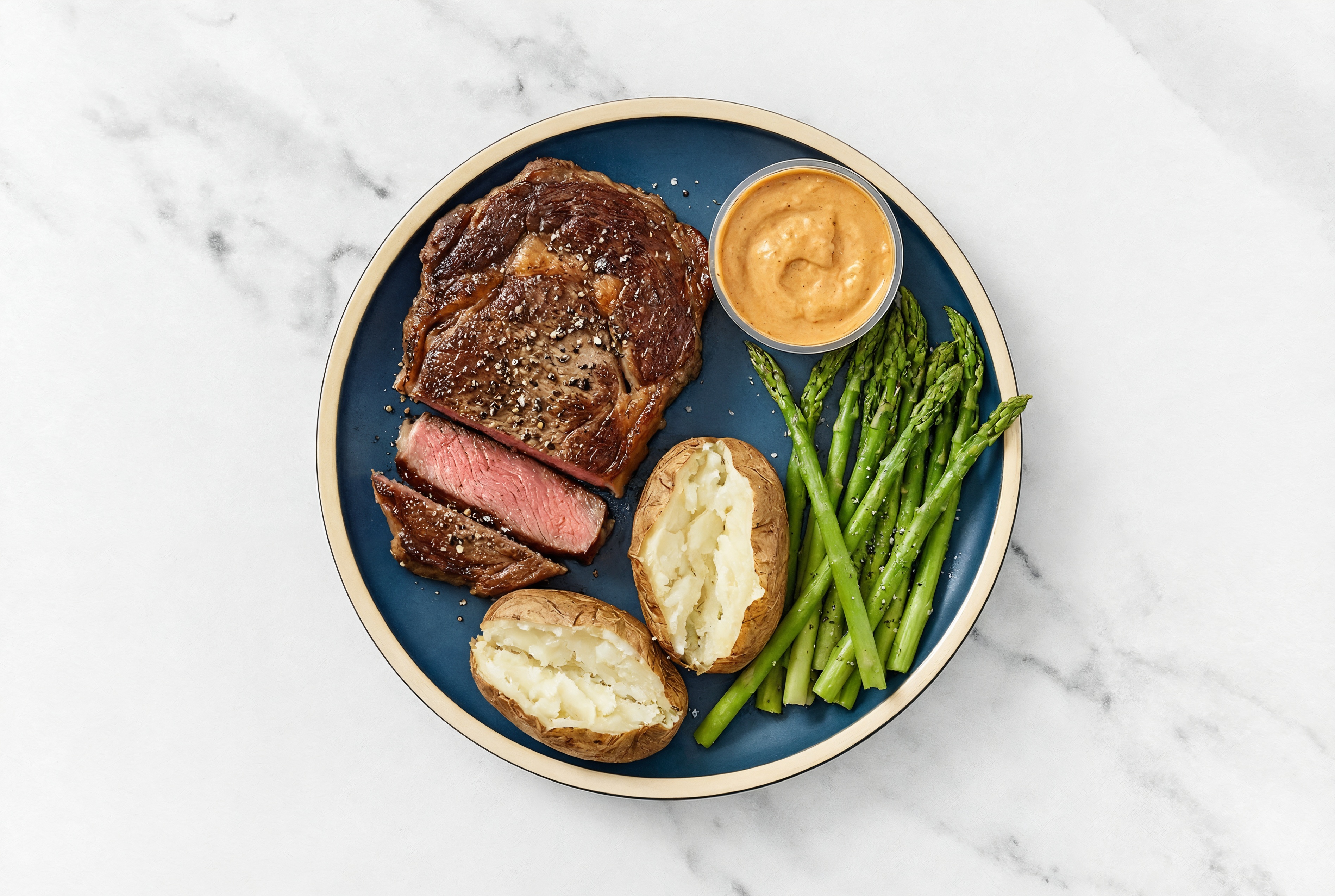 Ribeye, Asparagus + Baked Potatoes with a Dollop of Creamy Smoky BBQ