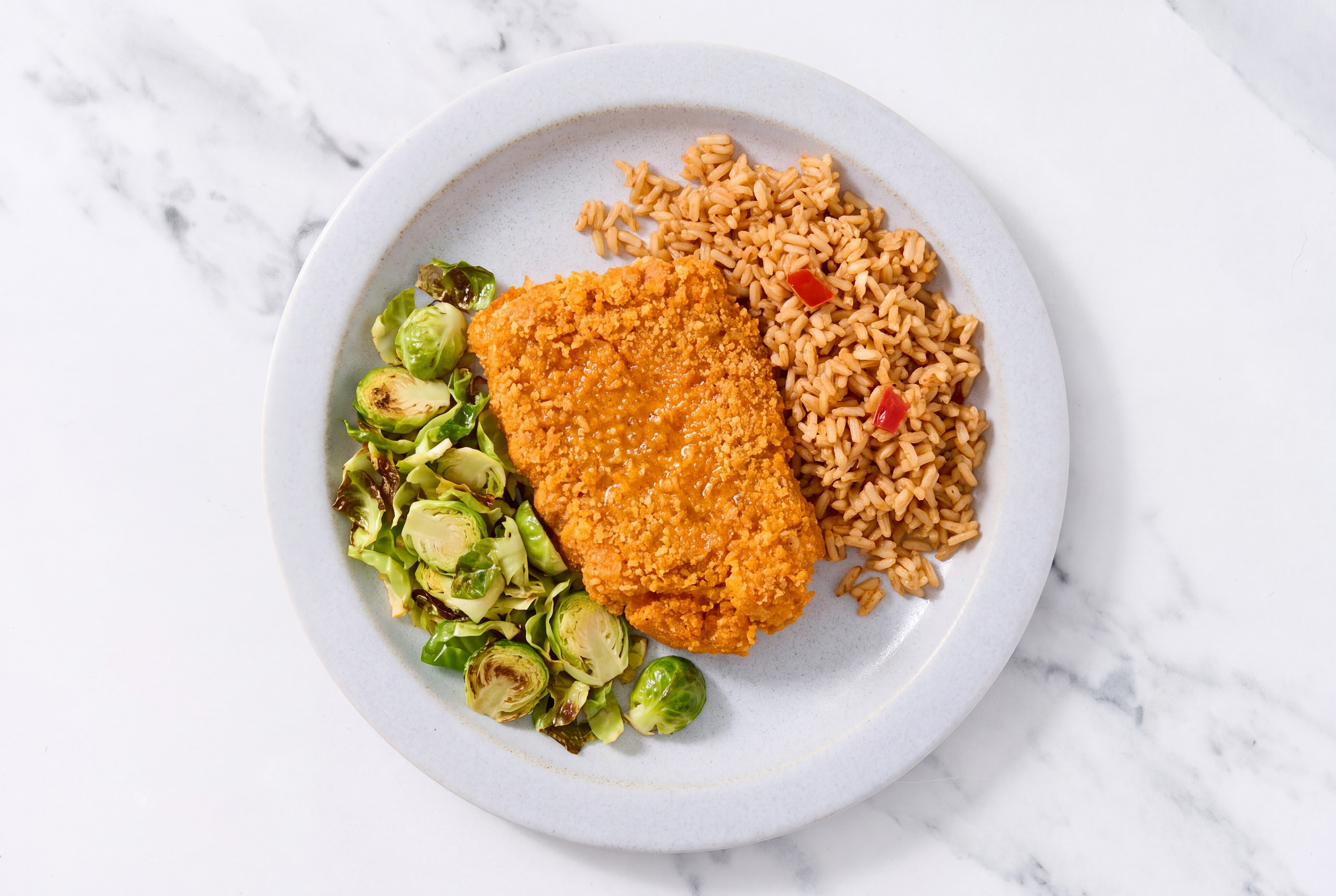 Hot Honey Breaded Chicken Cutlet with Brussels Sprouts & Mexican Rice