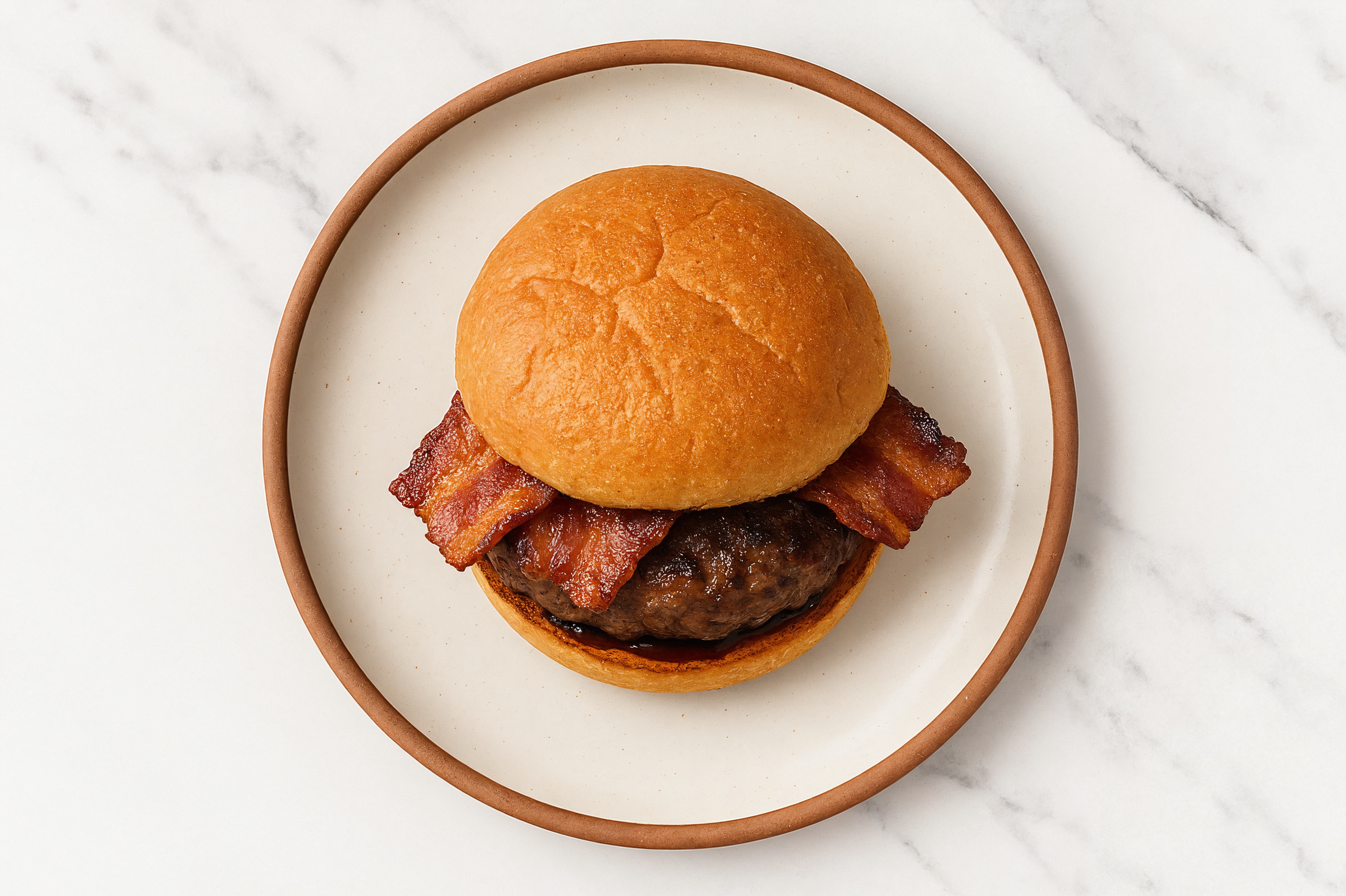 Lamb Burger on Gluten-Free Bun with Black Pepper & Applewood Smoked Pork Bacon