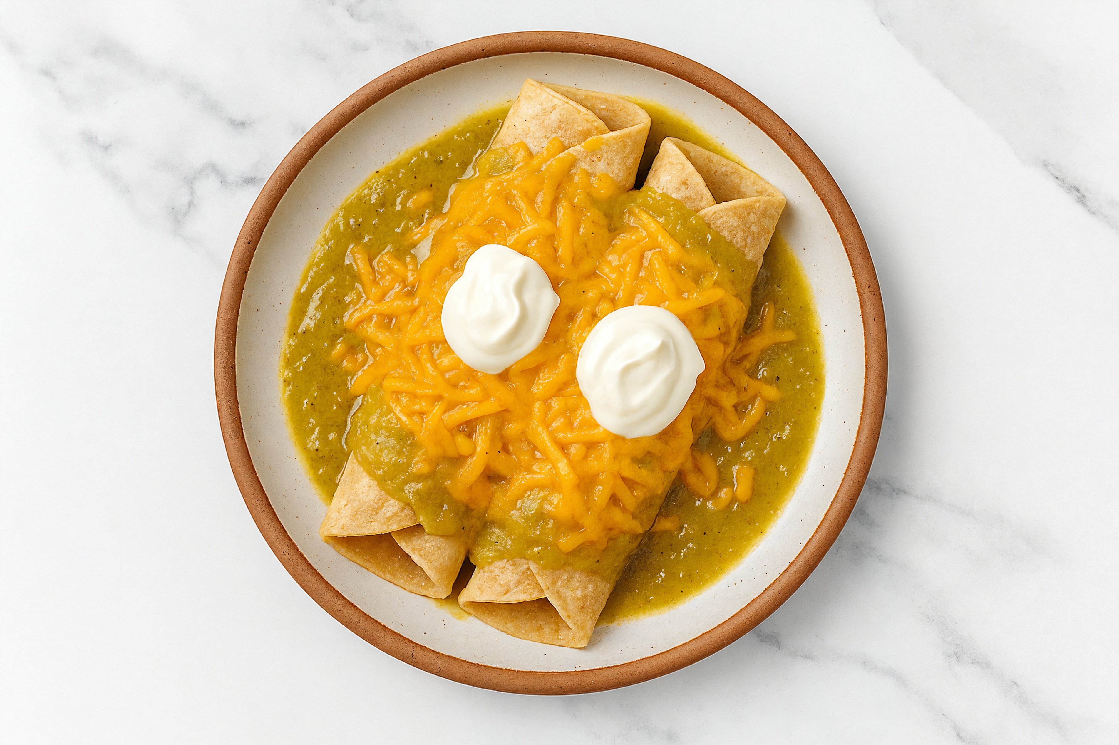Keto-Friendly Green Chile Chicken Enchiladas with Shredded Sharp Cheddar Cheese
