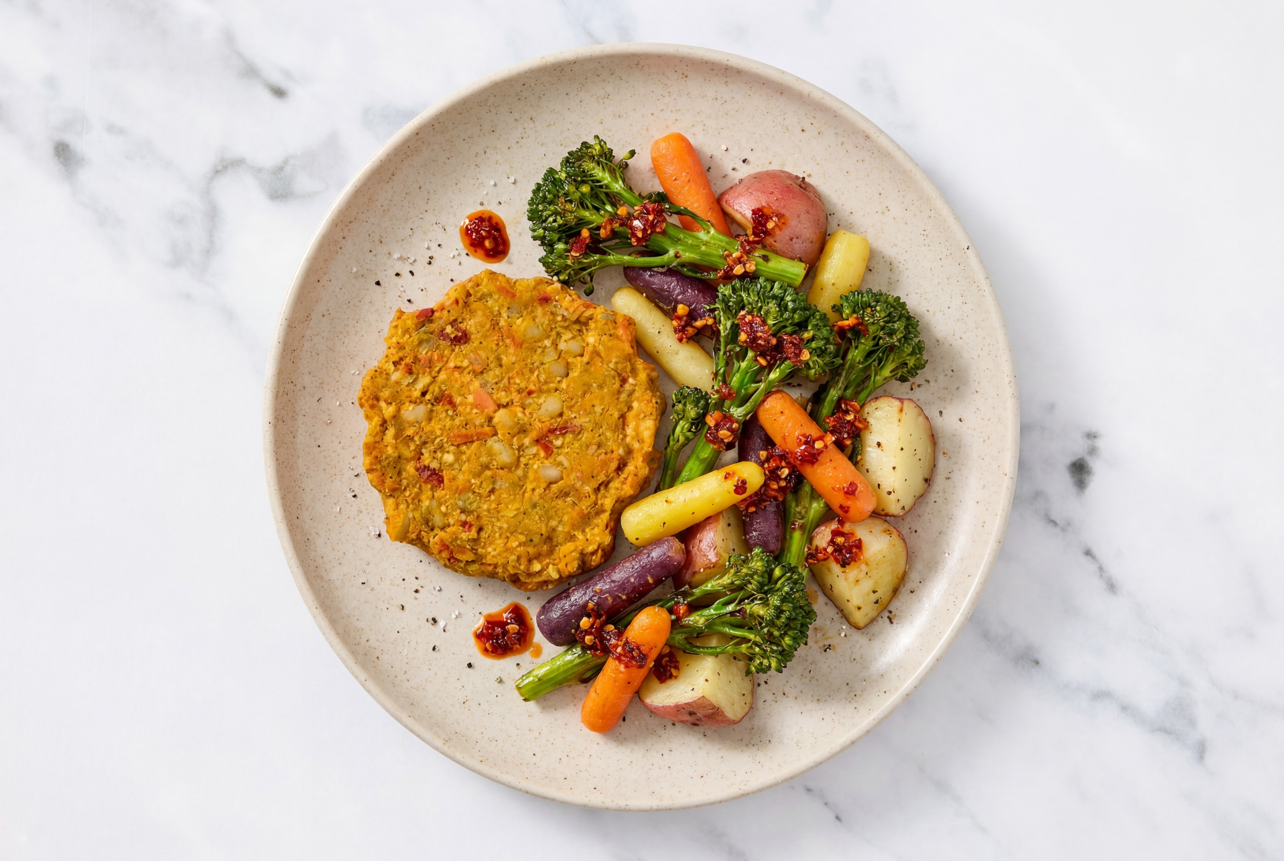 Roasted Carrots, Red Potatoe Chili Crisp Sweet Potato Burger Plate