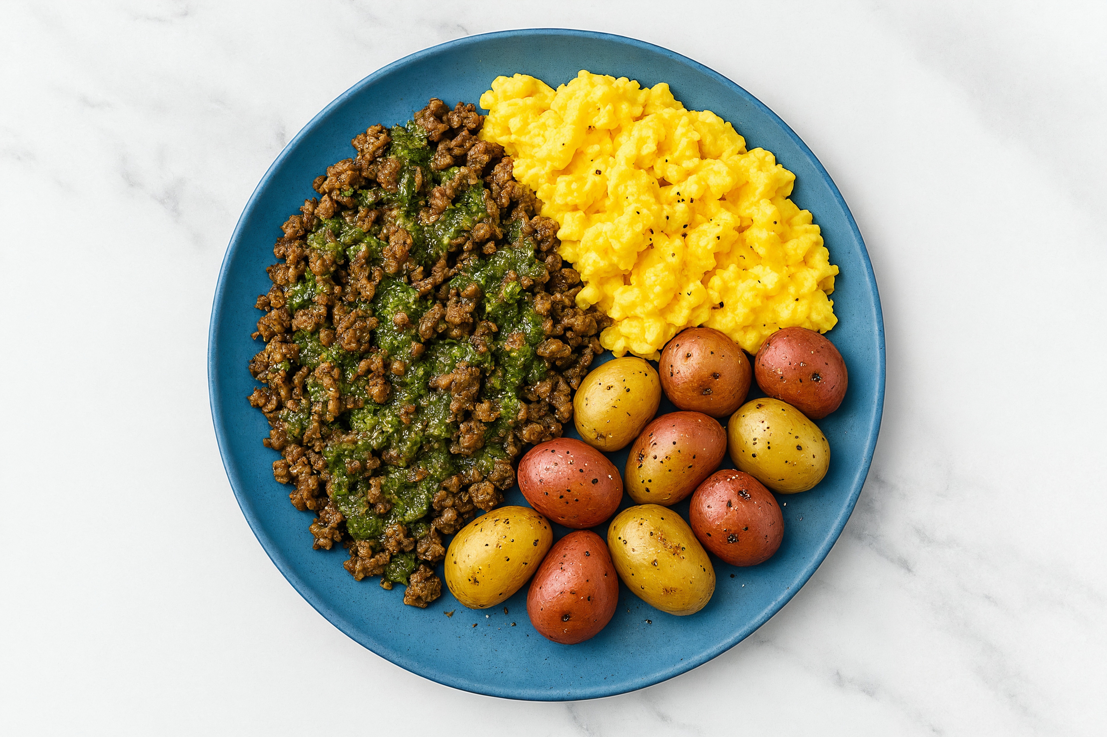 Eggs + Chimichurri BBQ Beef and Brisket Burger Plate with Multicolor Potatoes