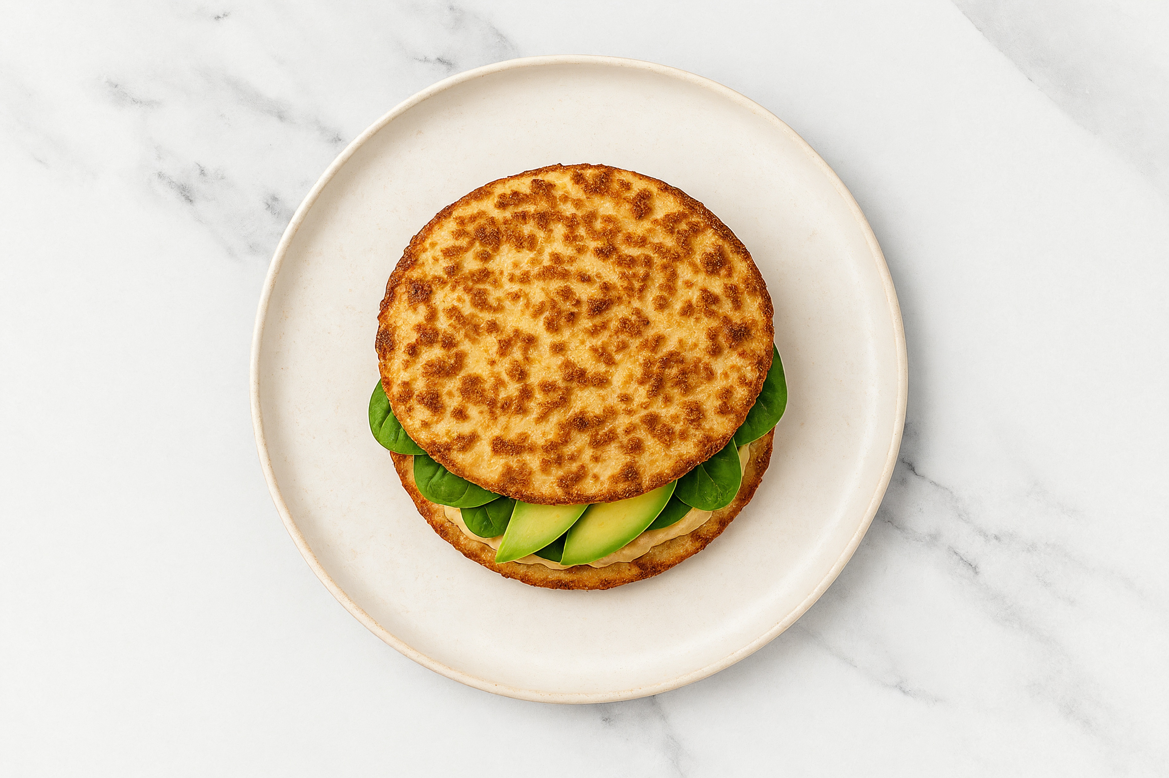 Lemony Lemon Garlic Hummus + Avo Sandwich on Cauli Thin
