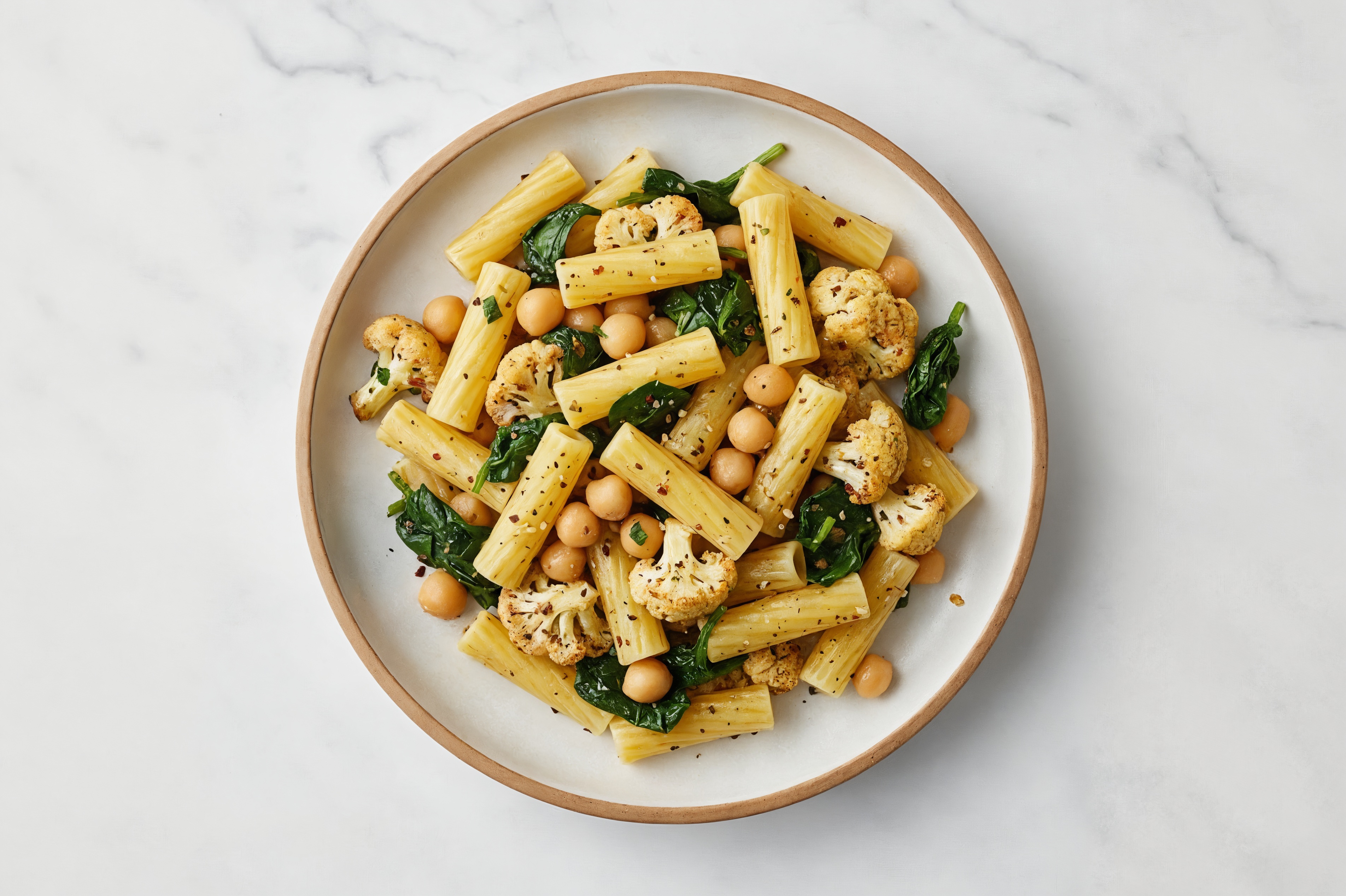  Rigatoni Bowl with Garbanzos + Cauliflower with Baby Spinach
