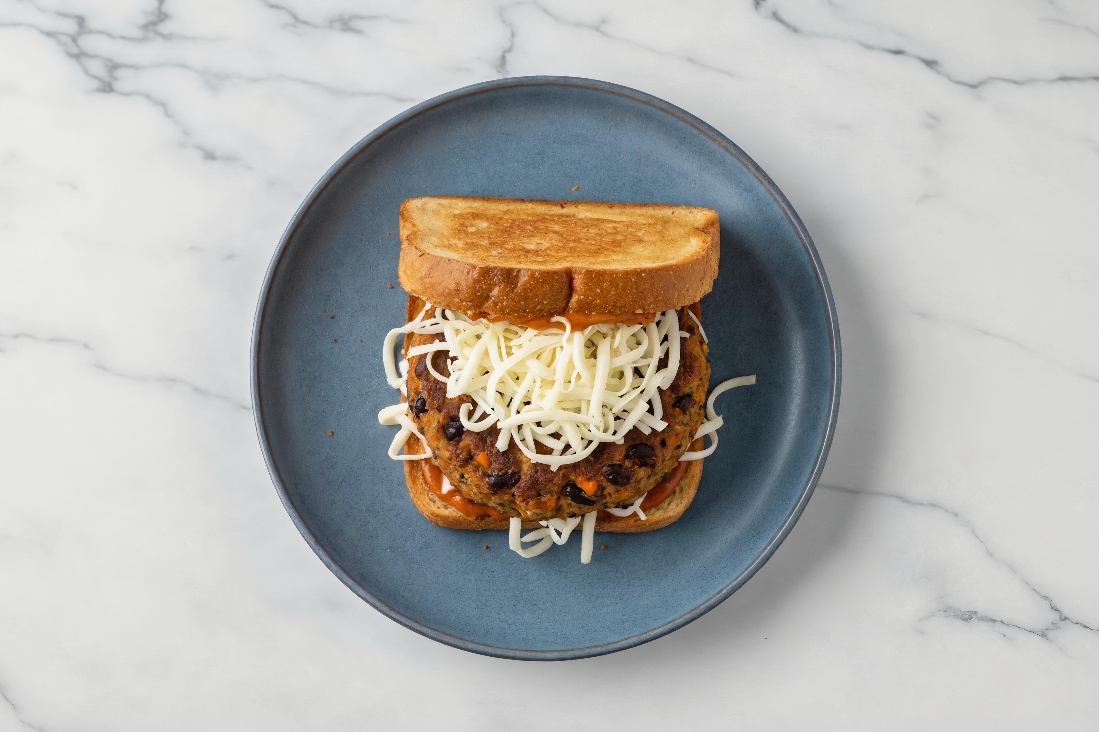 "Mozzarella" Black Bean Burger on GF Bread with Smoky BBQ Sauce