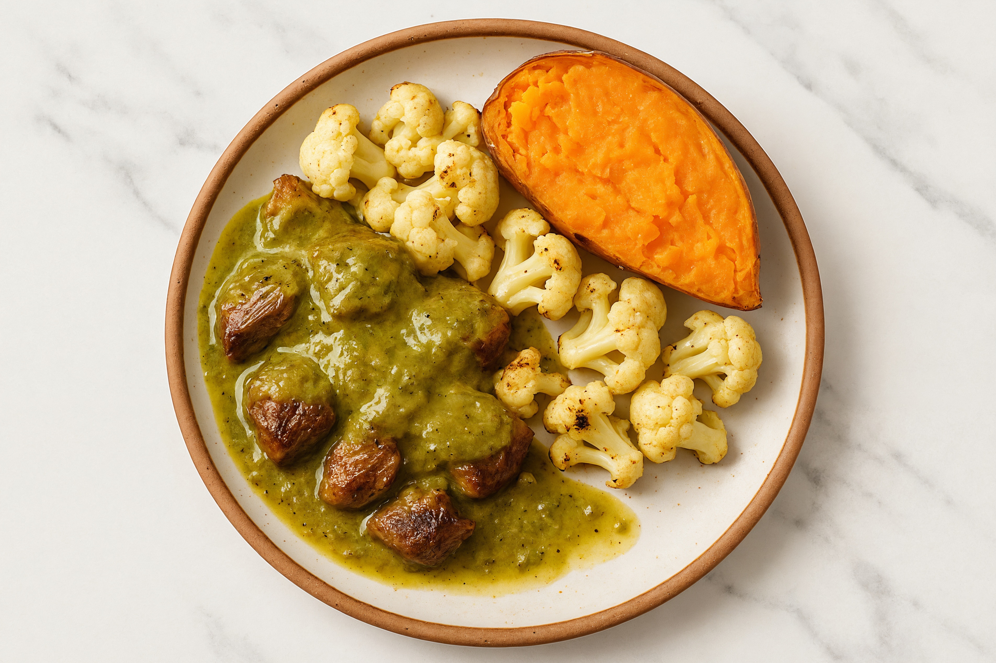 Green Chile Seared Lamb with Sweet Potato & Cauliflower Florets