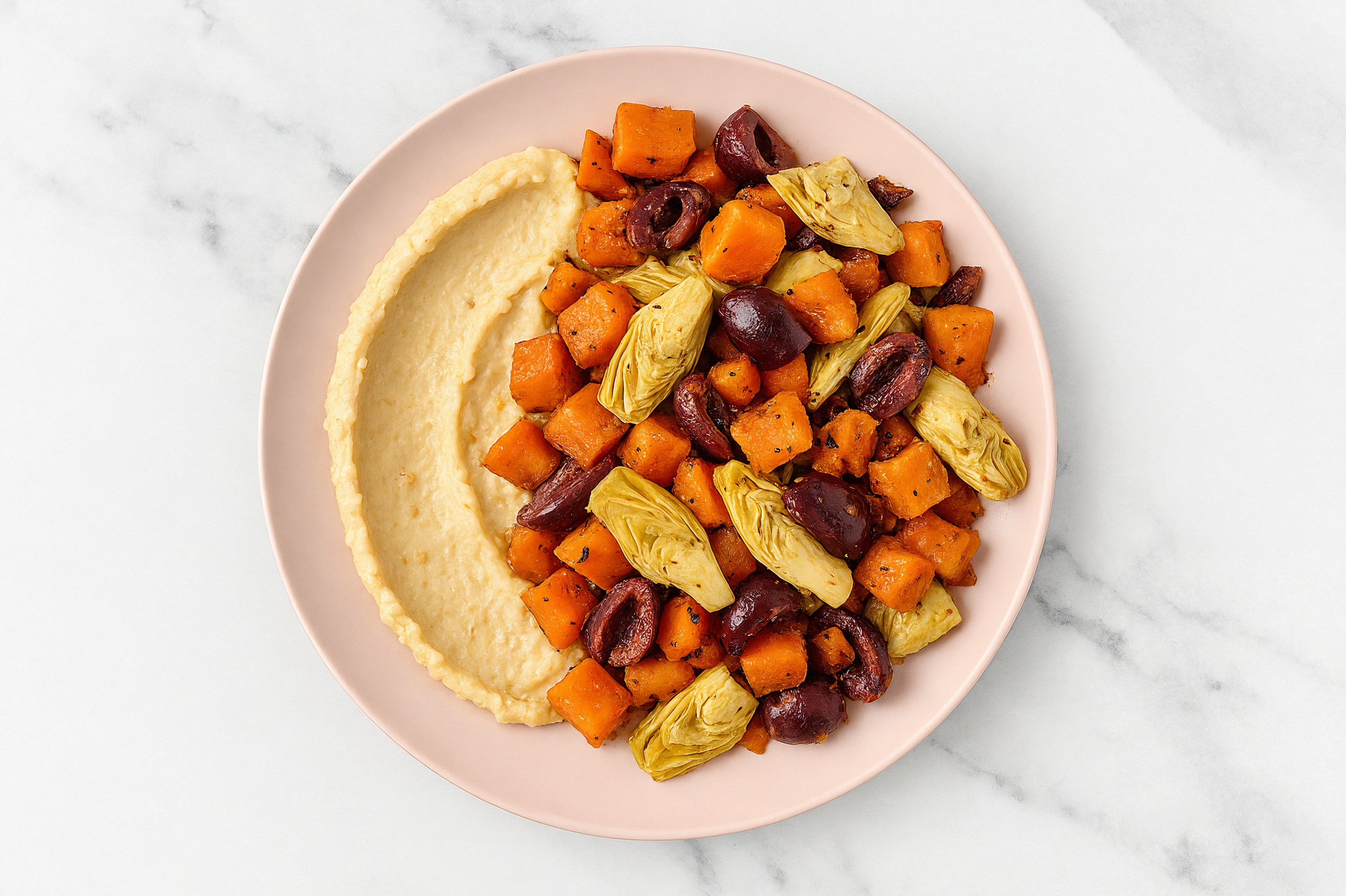 Olive Artichoke Sweet Potato Bowl over Lemon Garlic Hummus