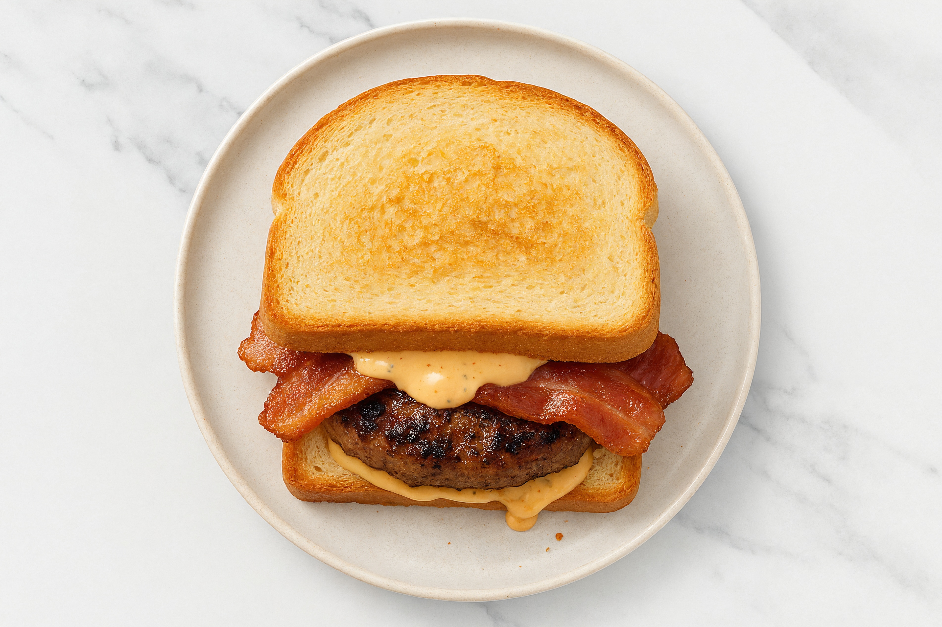 Applewood Smoked Pork Bacon Tavern Beef Burger on GF Bread with Buffalo Ranch