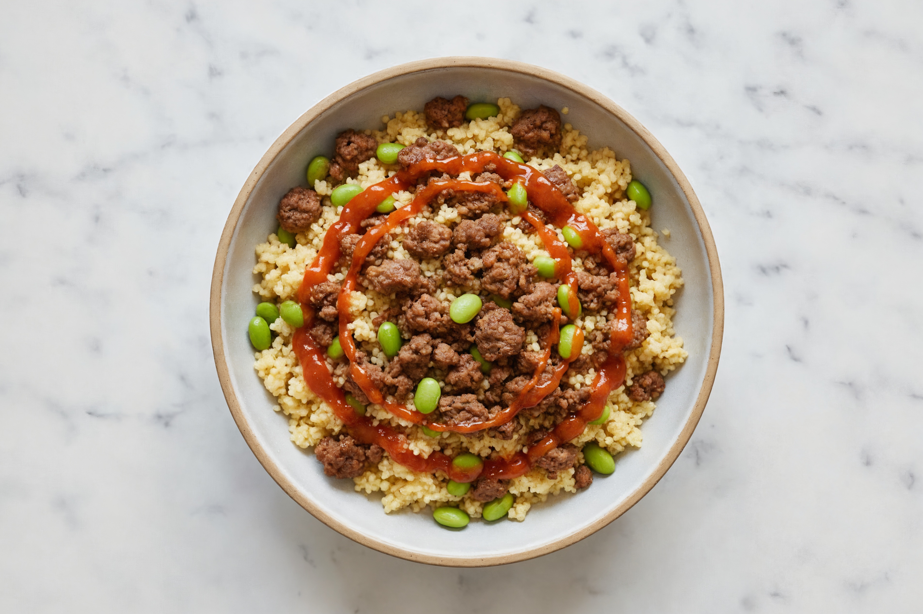 Sweet Chili Ground Lamb + Couscous Bowl with Edamame