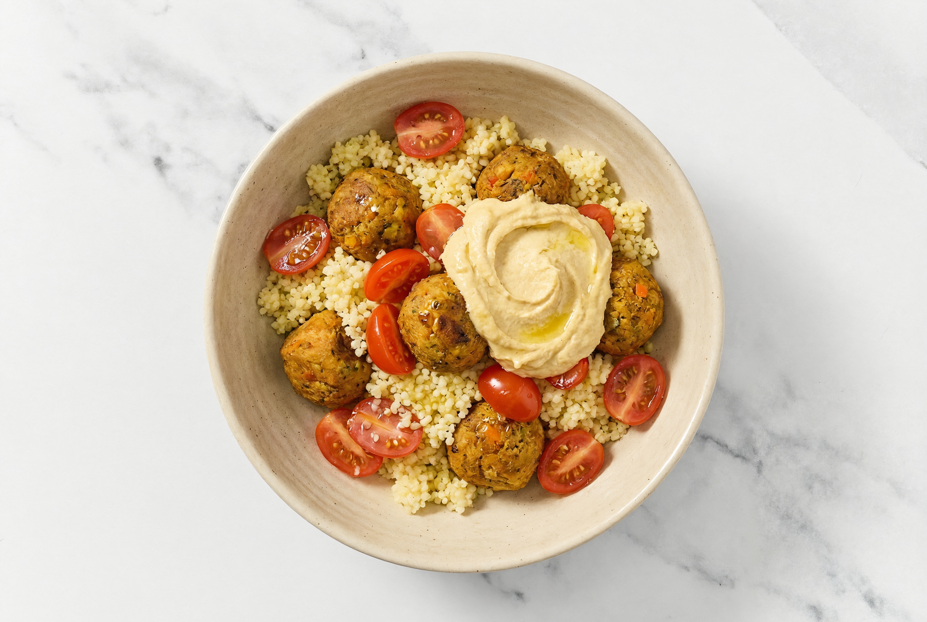 Eggplant Veggie Balls Couscous Grain Bowl with Olive Oil Sea Salt Hummus