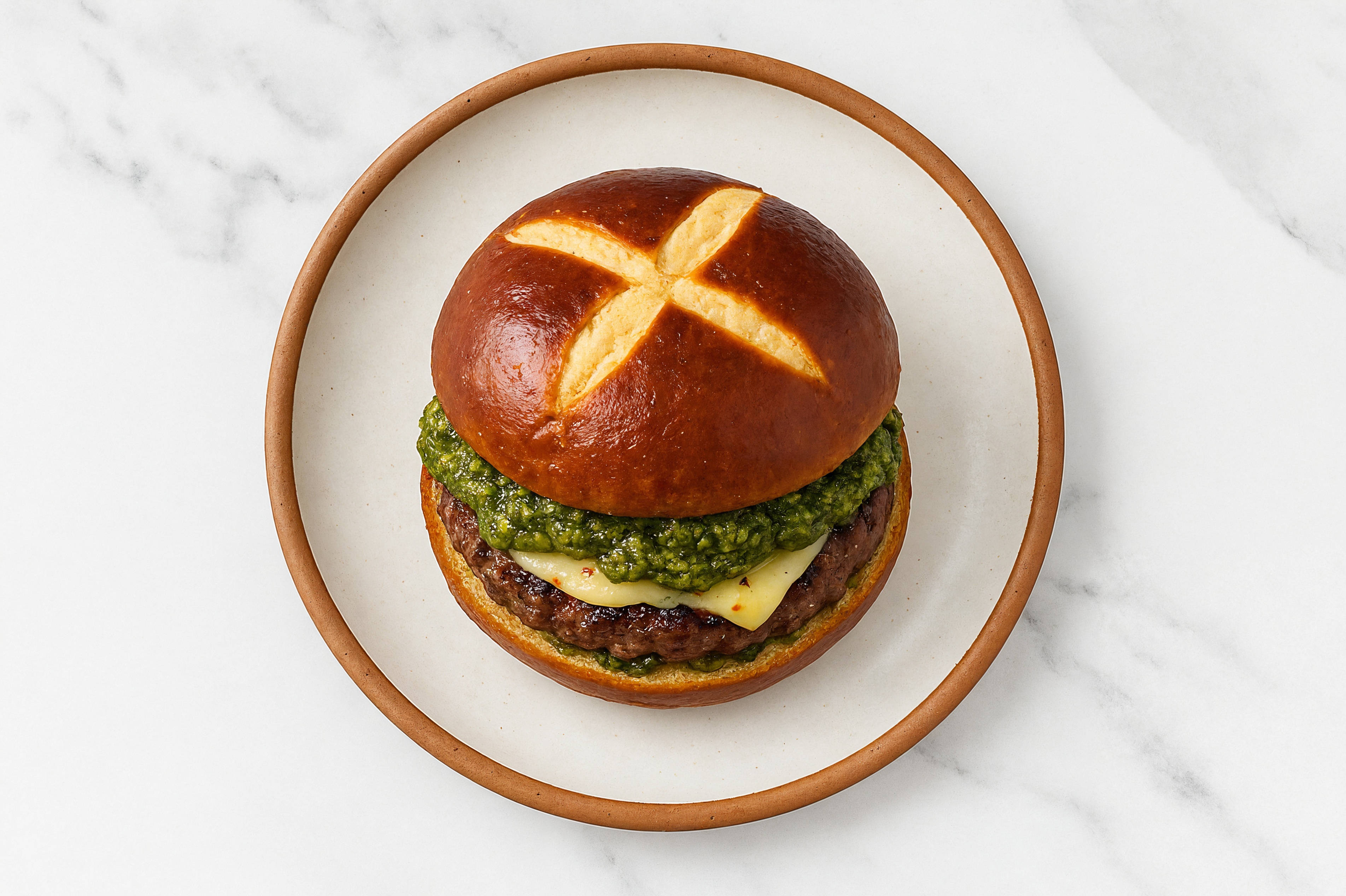 Bison Burger on Pretzel with Spinach Pesto & Pepper Jack