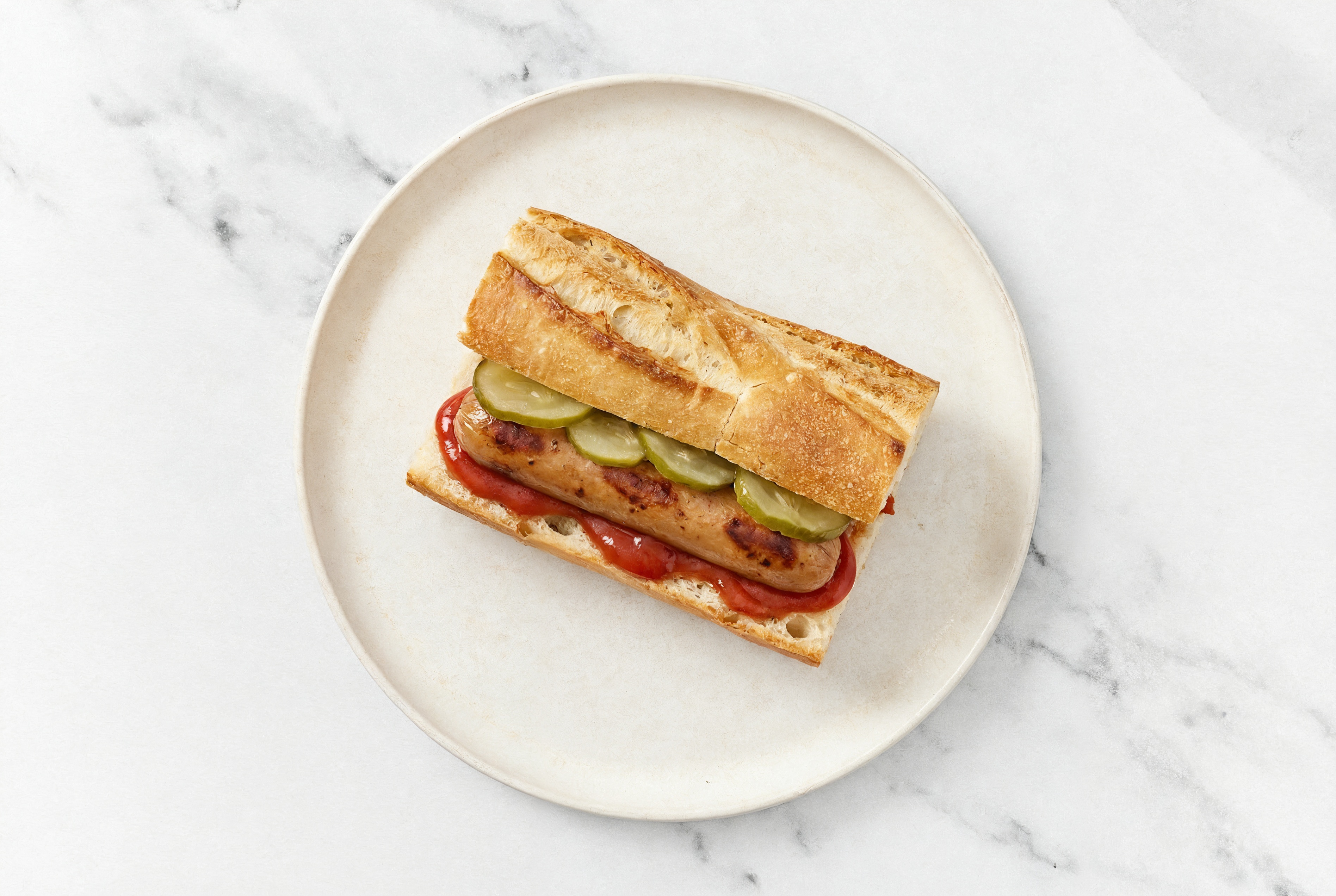 Pickle Smart Dog with Ketchup on Baguette