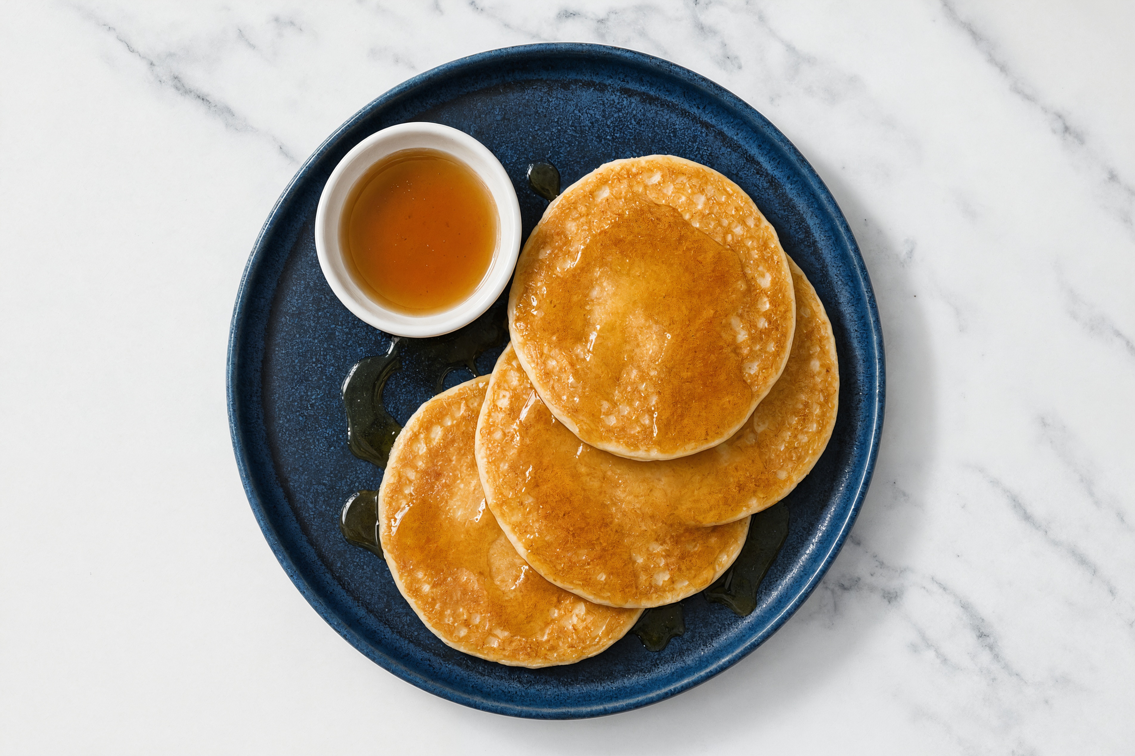 Vanilla Protein Pancakes + Maple Syrup
