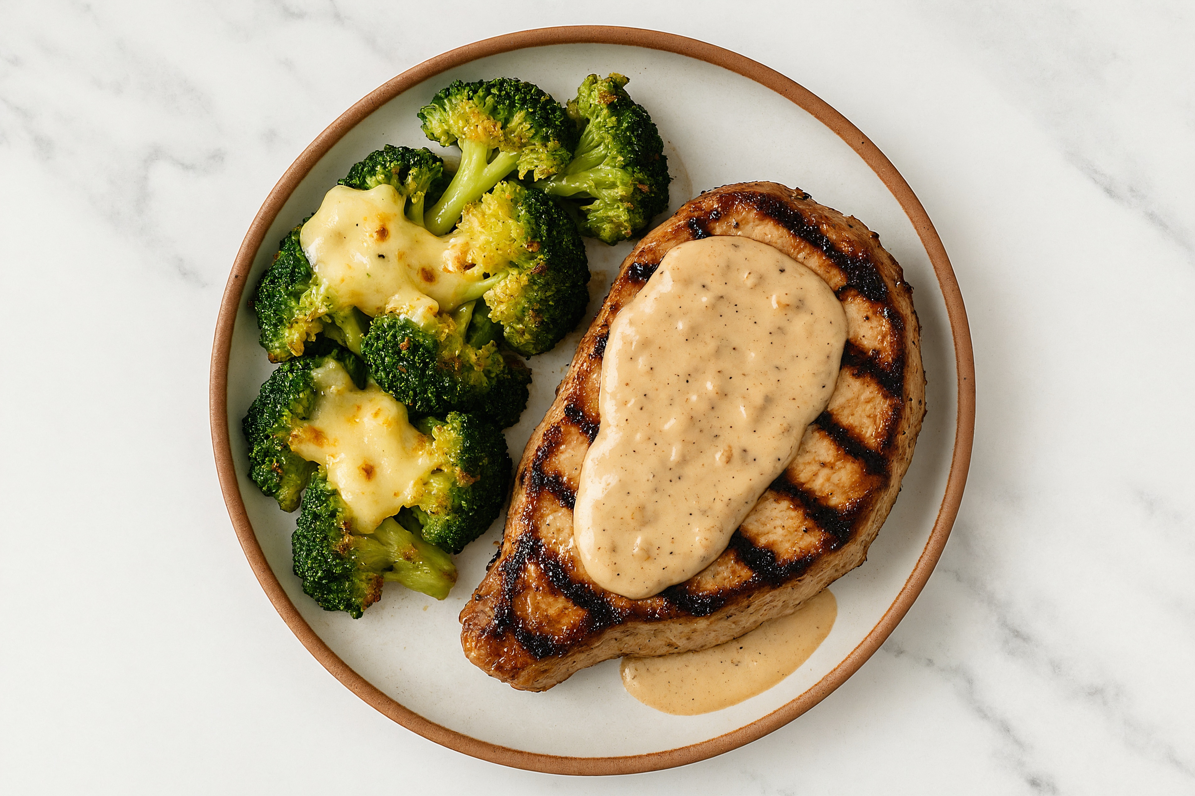 French Onion-Smothered Grilled Boneless Pork Chops + Cheesy Organic Broccoli