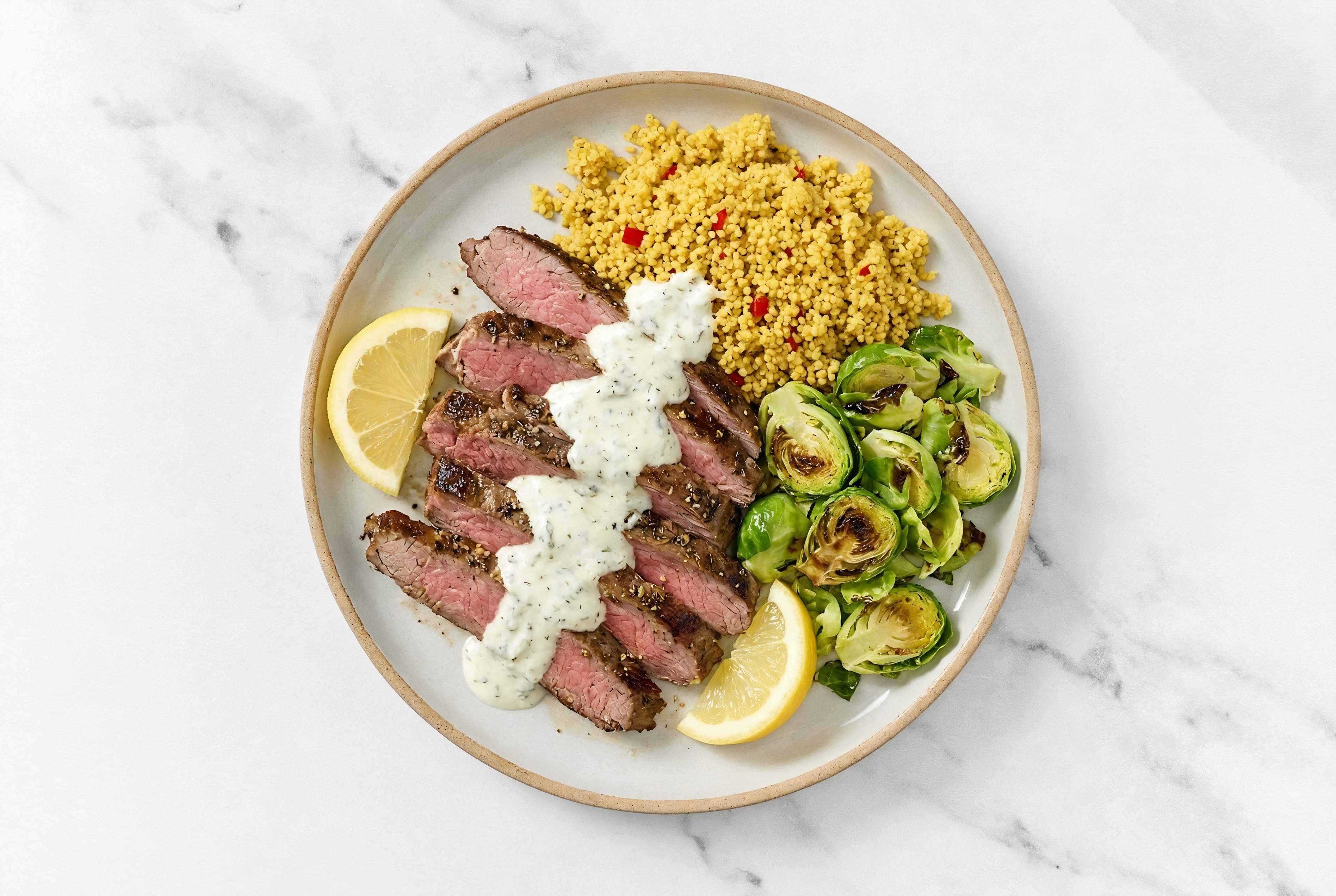 Rosemary Garlic Beef Flank Steak + Brussels Moroccan Couscous Bowl