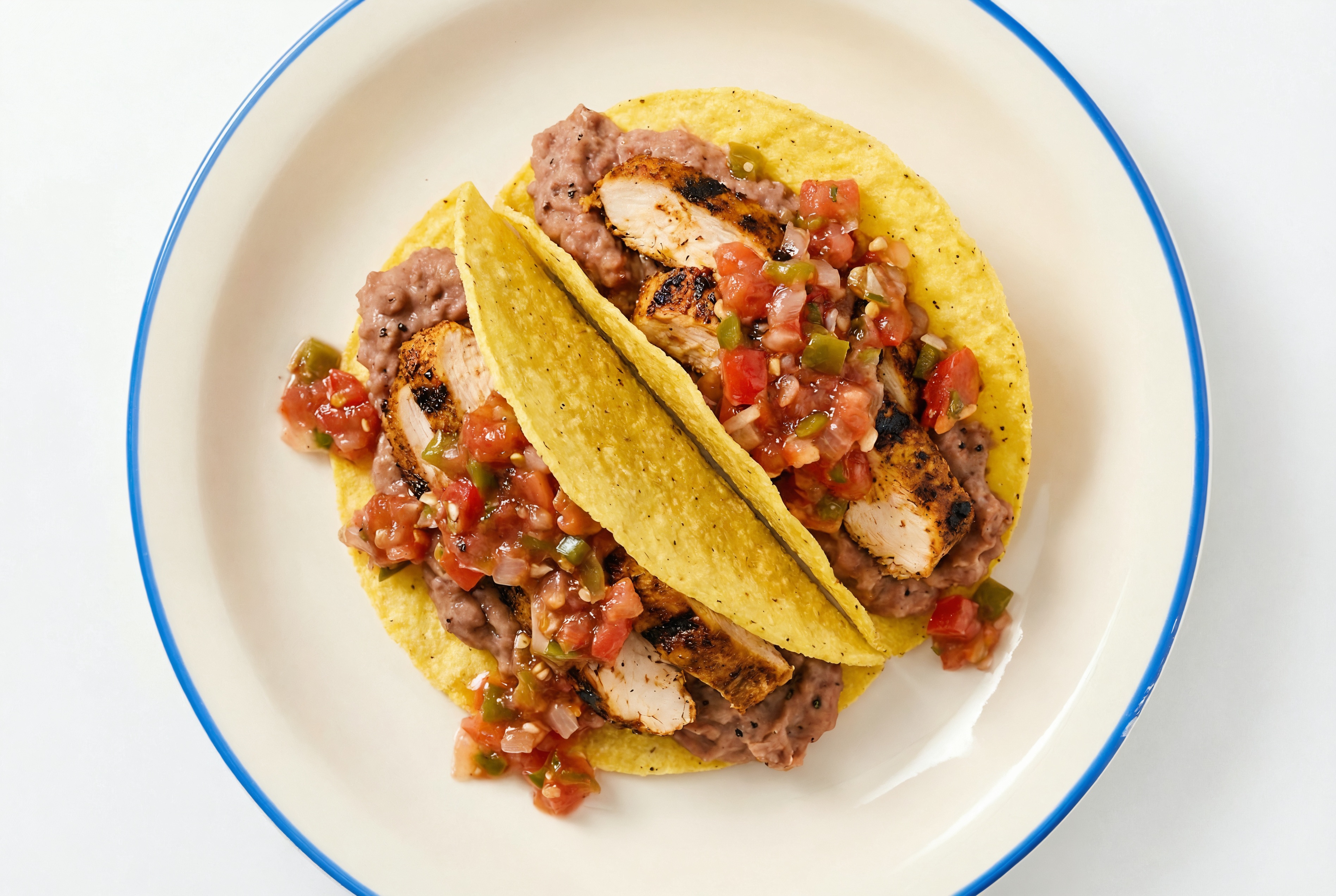 Savory Blackened Chicken Tacos with Pico De Gallo & Refried Red Beans
