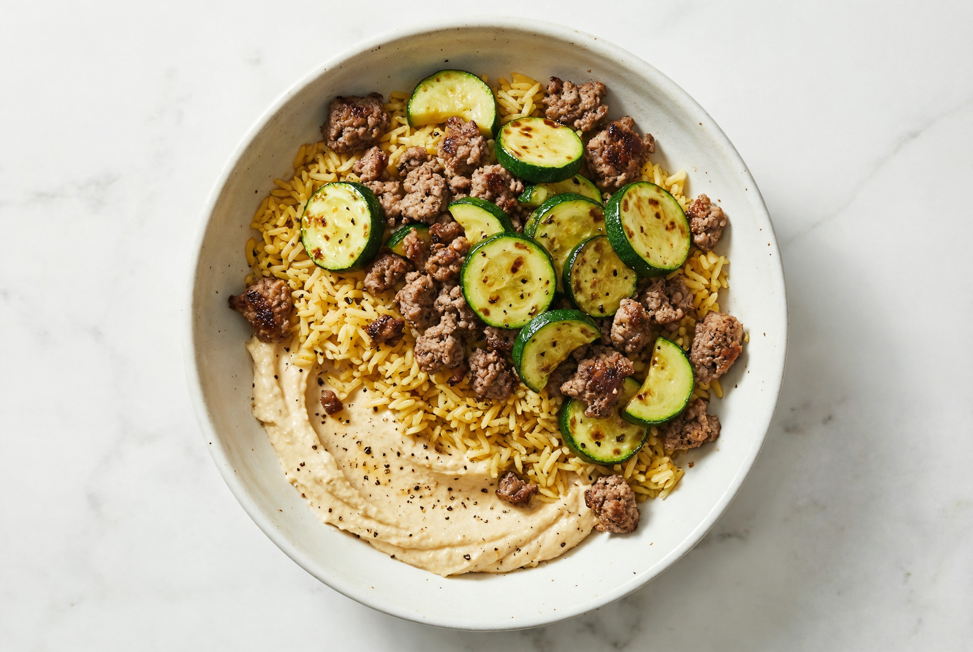 Ground Beef & Zucchini Grain Bowl with Onion Hummus