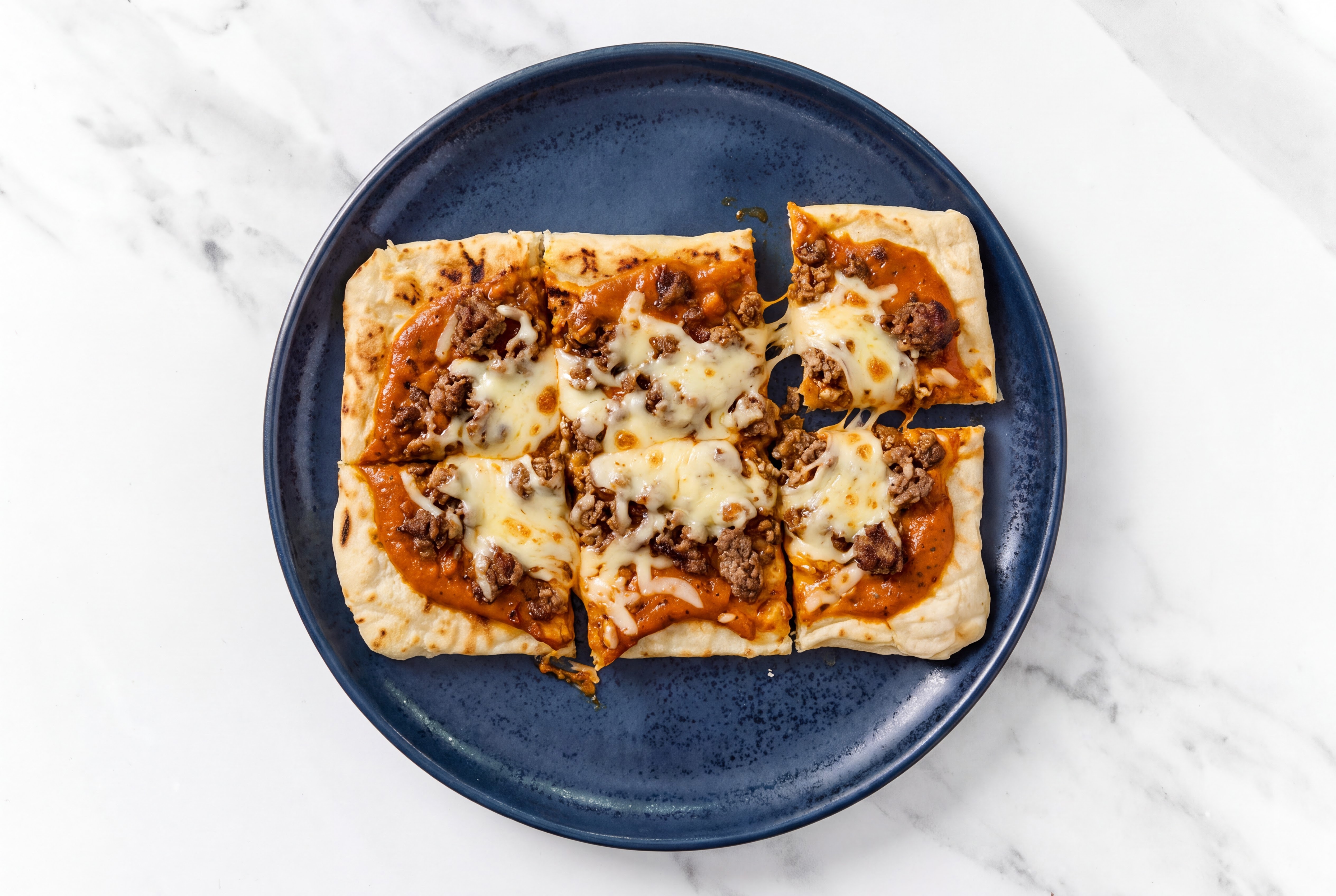 Spiced Tikka Ground 93/7 Lean Beef Grilled Pizza with Mild Havarti