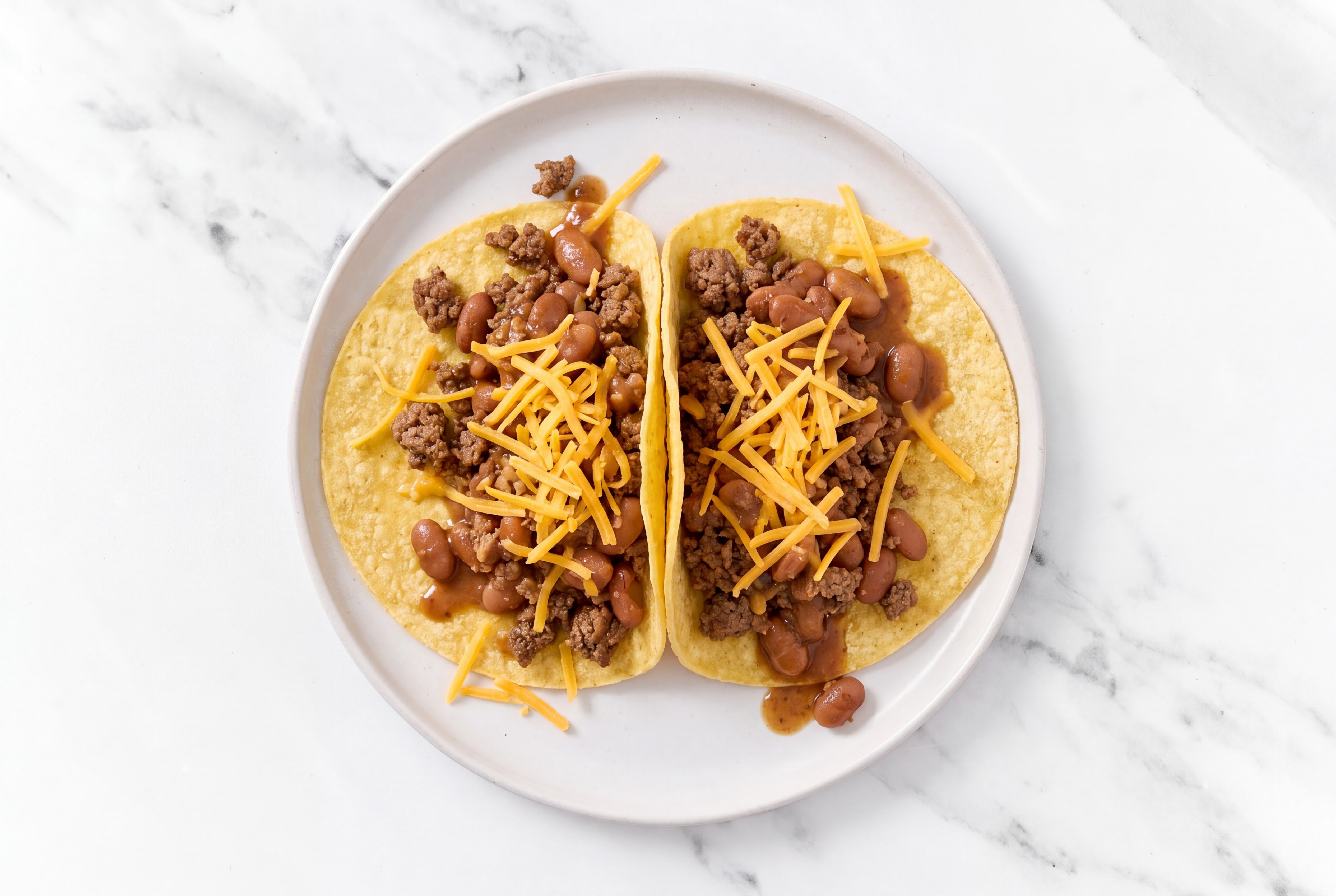Herby Ground 93/7 Lean Beef Tacos with Cheddar Cheese & Pinto Beans